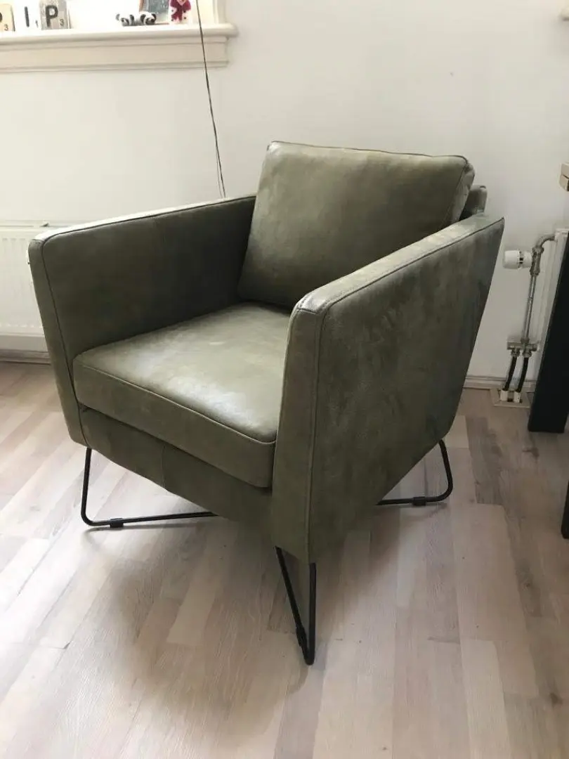 afbeelding van Fauteuil van leer met kruisframe - groen leer