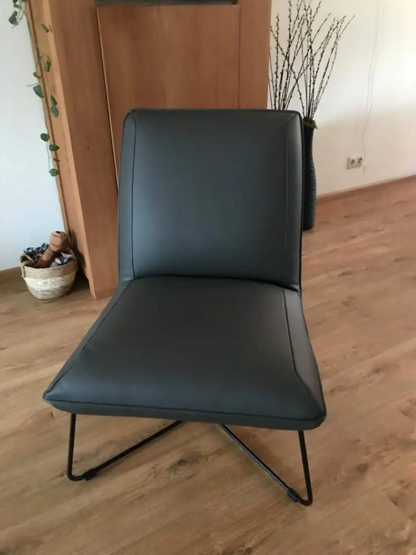afbeelding van Leren fauteuil zonder armleuning met kruisframe - grijs leer