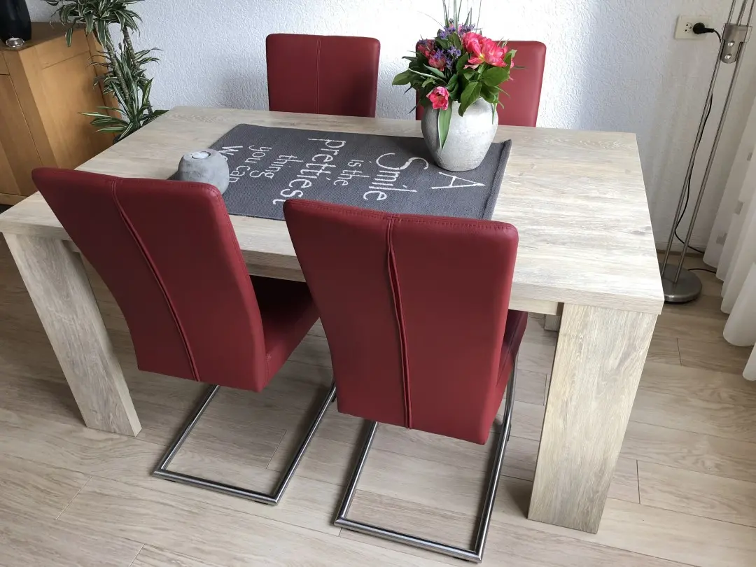 afbeelding van Set van 4 leren eetkamerstoelen - met sledepoot - rood leer