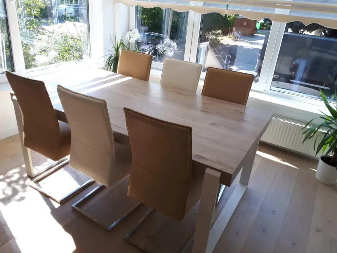 afbeelding van Set van 6 leren eetkamerstoelen met sledepoot RVS - diverse kleuren