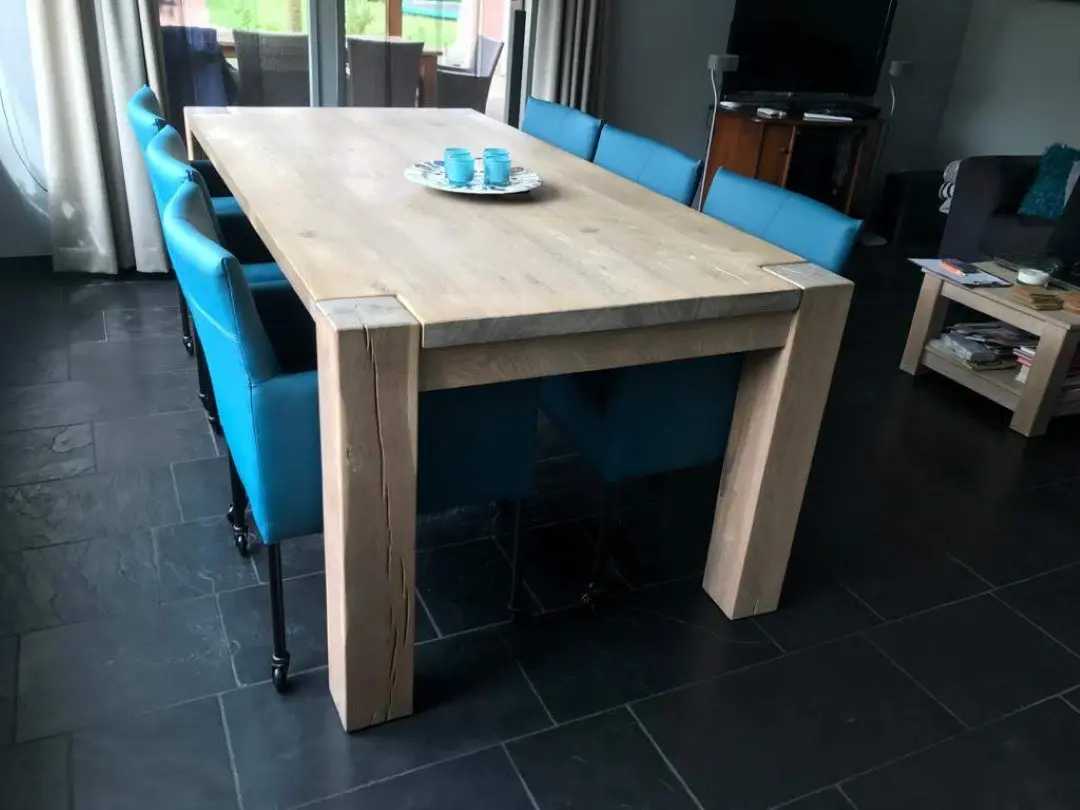 afbeelding van Set van 6 leren kuip eetkamerstoelen blauw leer met wieltjes