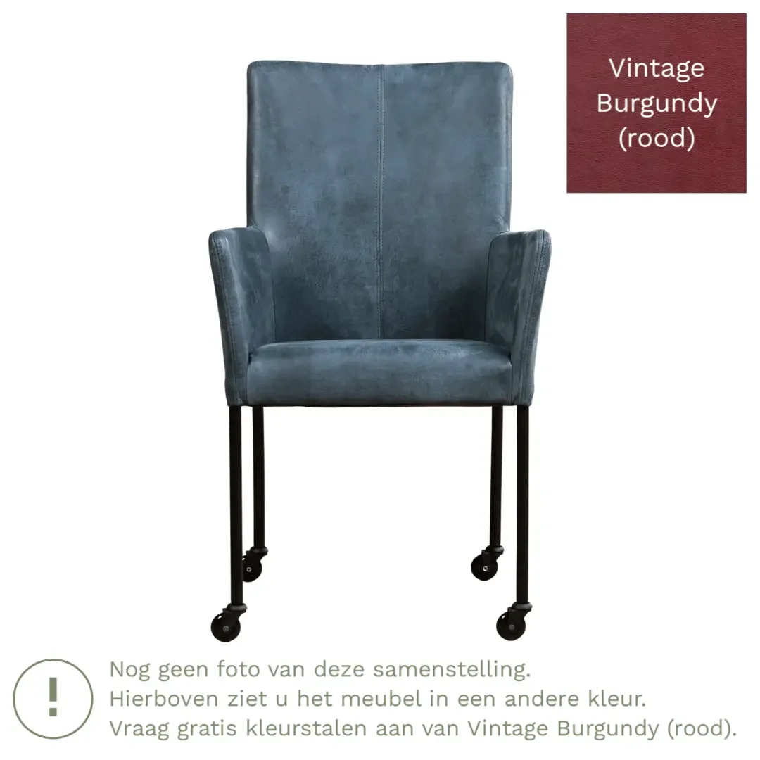 afbeelding van Leren eetkamerstoel Comfort met wieltjes en armleuning - Vintage Burgundy (rood) - Poten staal rond RVS