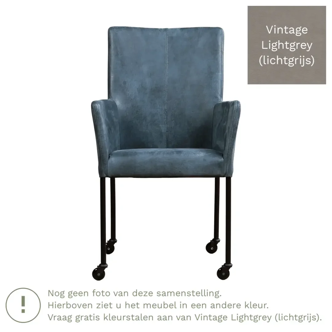 afbeelding van Leren eetkamerstoel Comfort met wieltjes en armleuning - Vintage Lightgrey (lichtgrijs) - Poten staal rond RVS