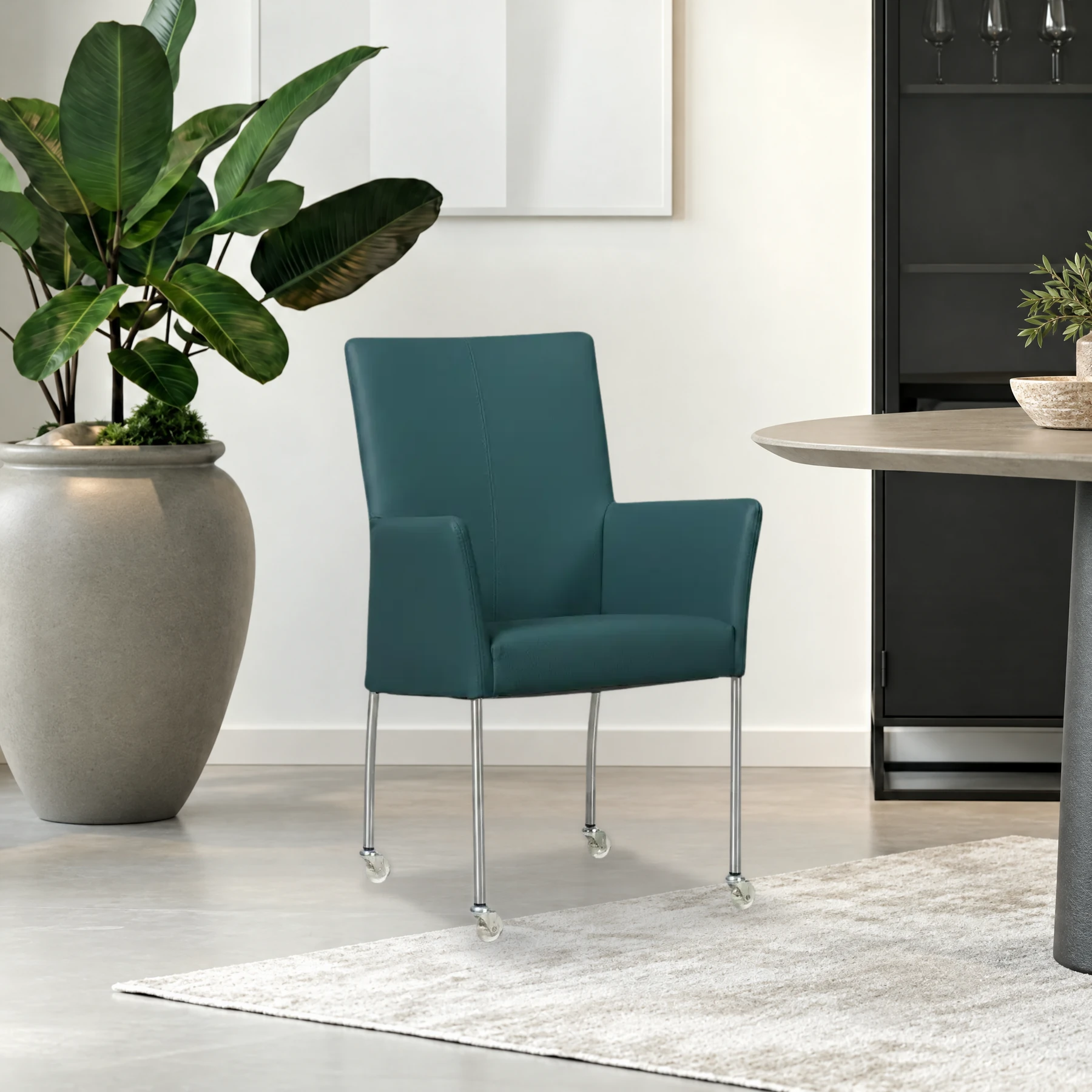 afbeelding van Leren eetkamerstoel Comfort met wieltjes en armleuning - Toledo Turquoise (blauw) - Poten staal rond RVS