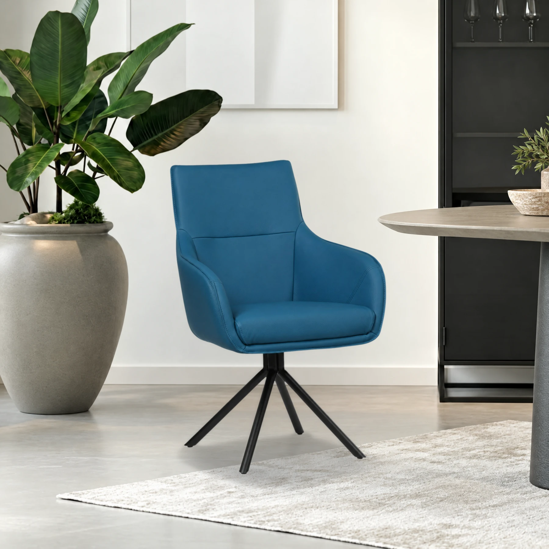 afbeelding van Leren draaibare eetkamerstoel Fancy - Toledo Turquoise (blauw) - Spinpoot staal rond zwart