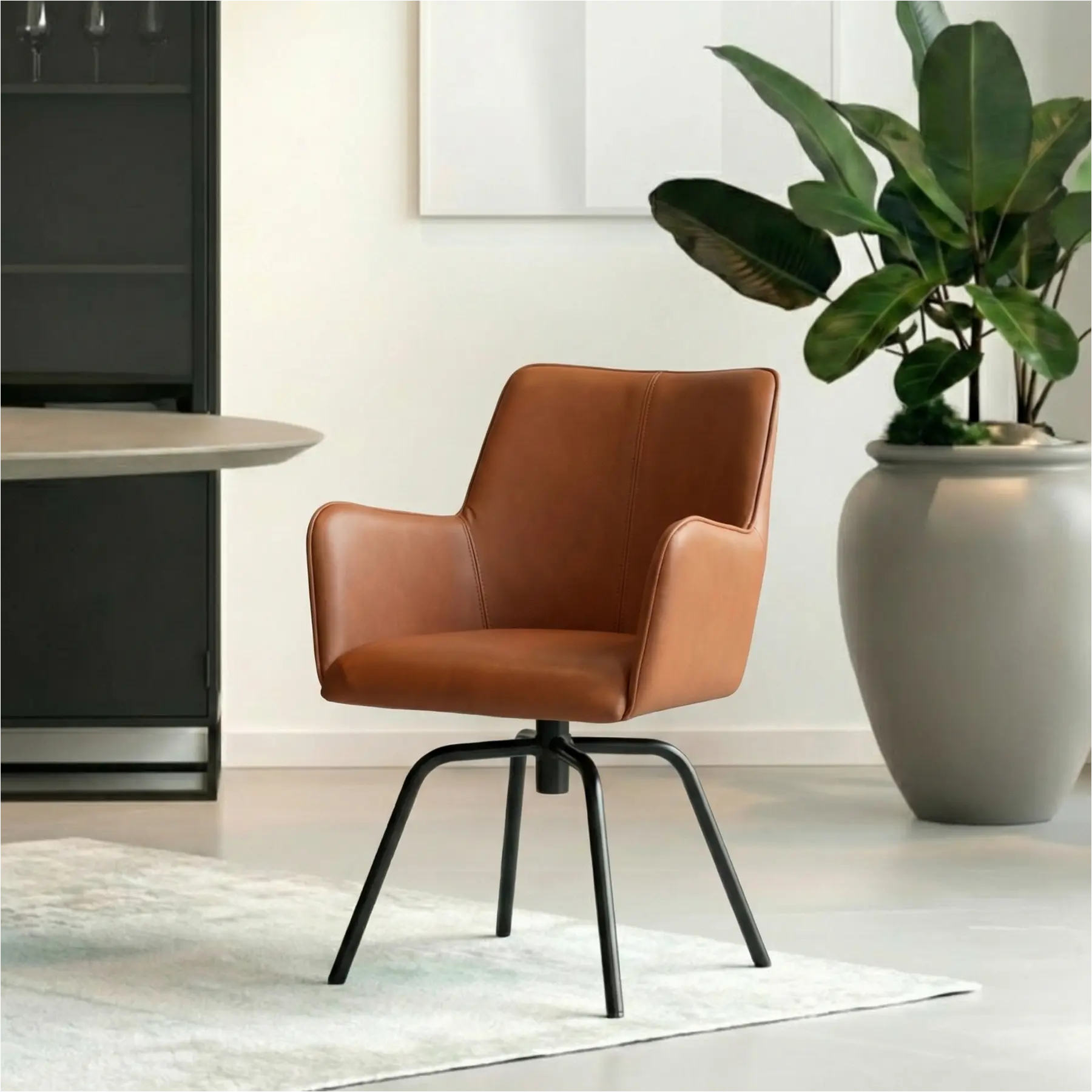 afbeelding van Leren draaibare eetkamerstoel Jazz - Spinpoot staal rond zwart