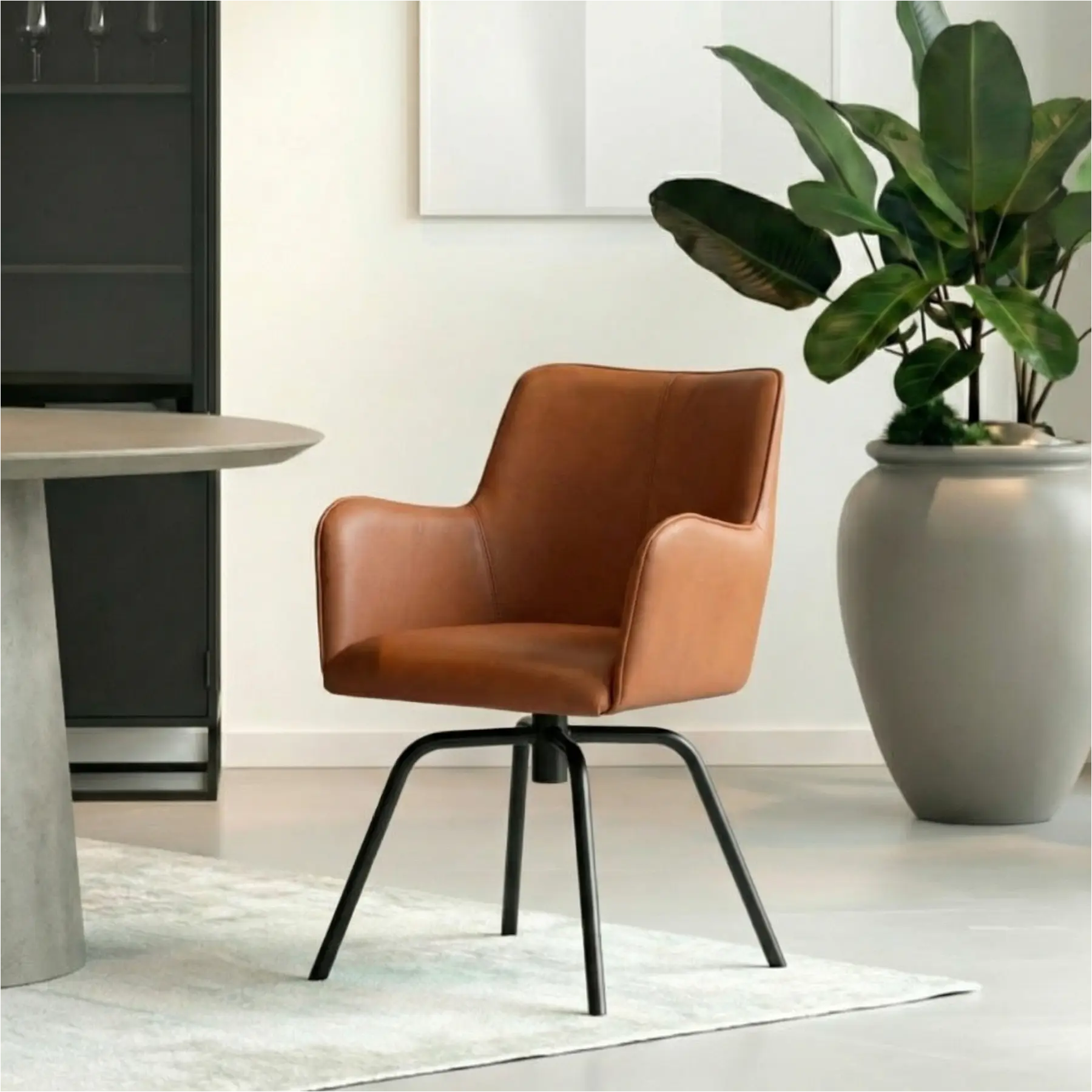 afbeelding van Leren draaibare eetkamerstoel Jazz - Toledo Natur (cognac) - Spinpoot staal rond zwart