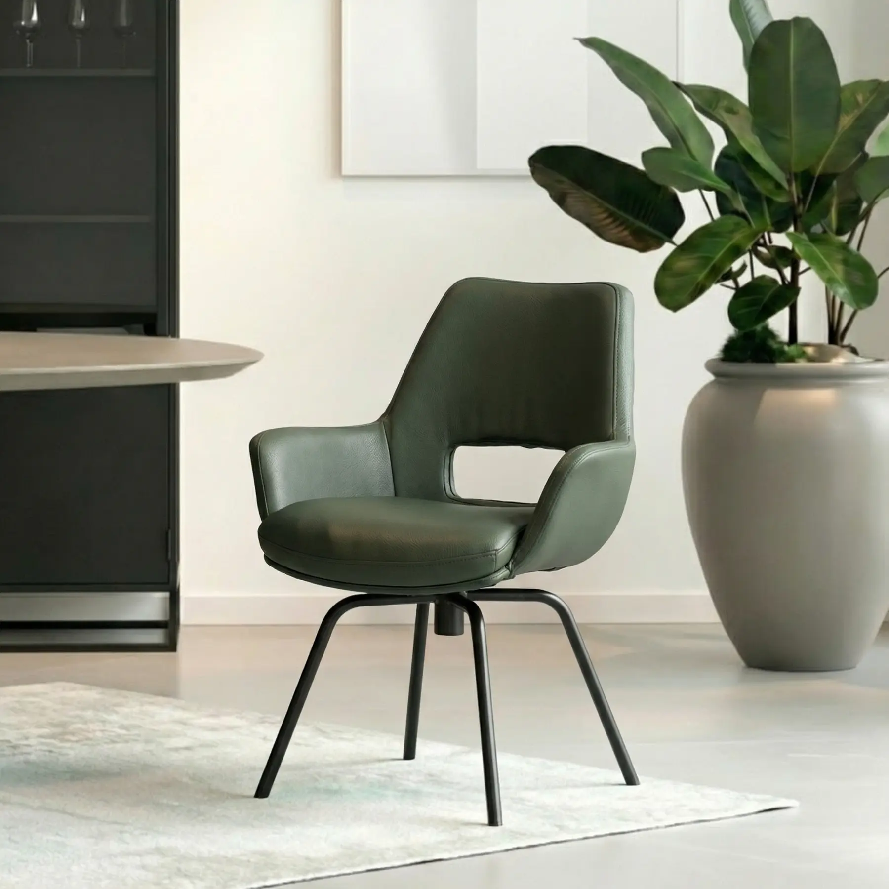 afbeelding van Leren draaibare eetkamerstoel Zippy - Hermes Verde (donkergroen) - Spinpoot staal rond zwart