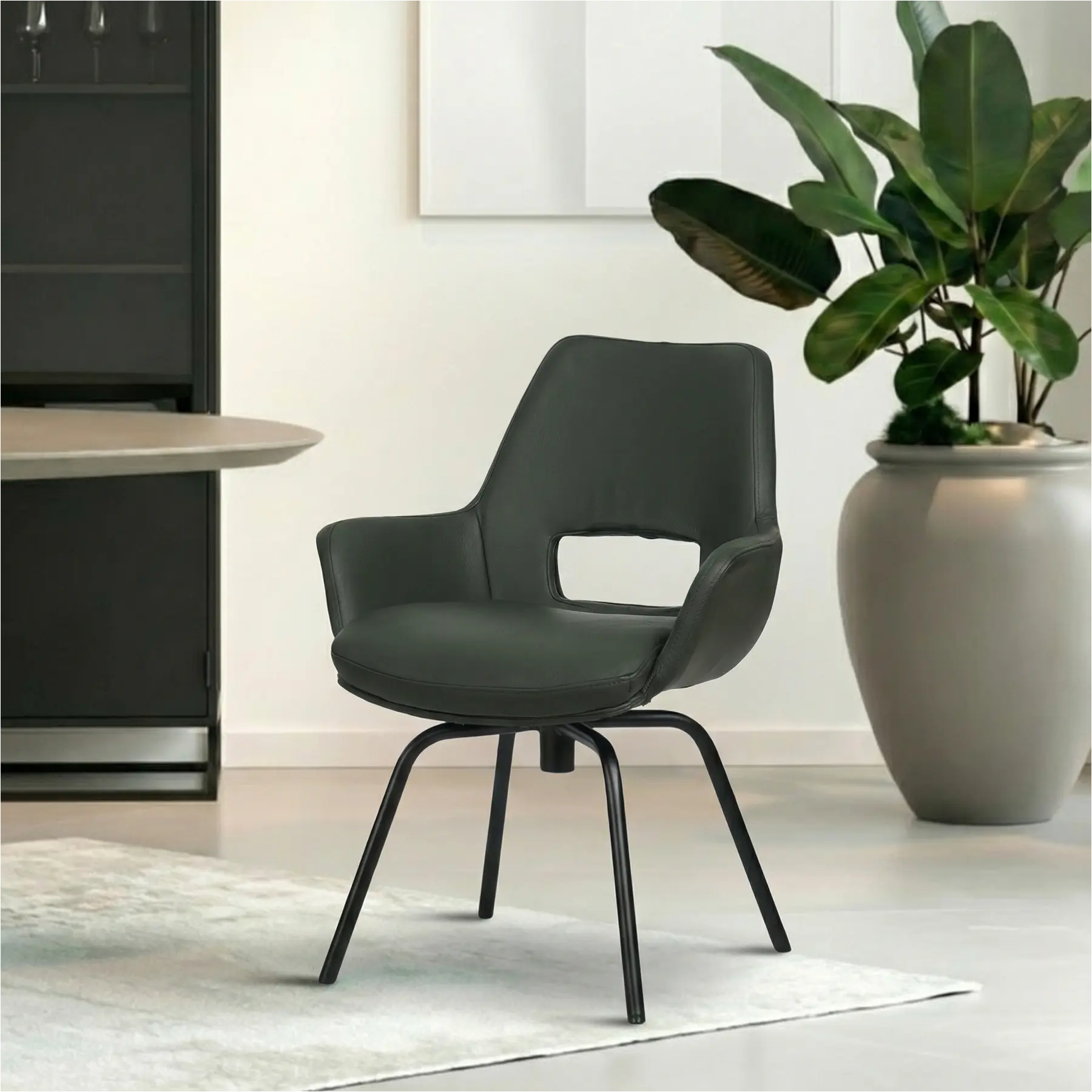 afbeelding van Leren draaibare eetkamerstoel Zippy - Toledo Verde (donkergroen) - Spinpoot staal rond zwart