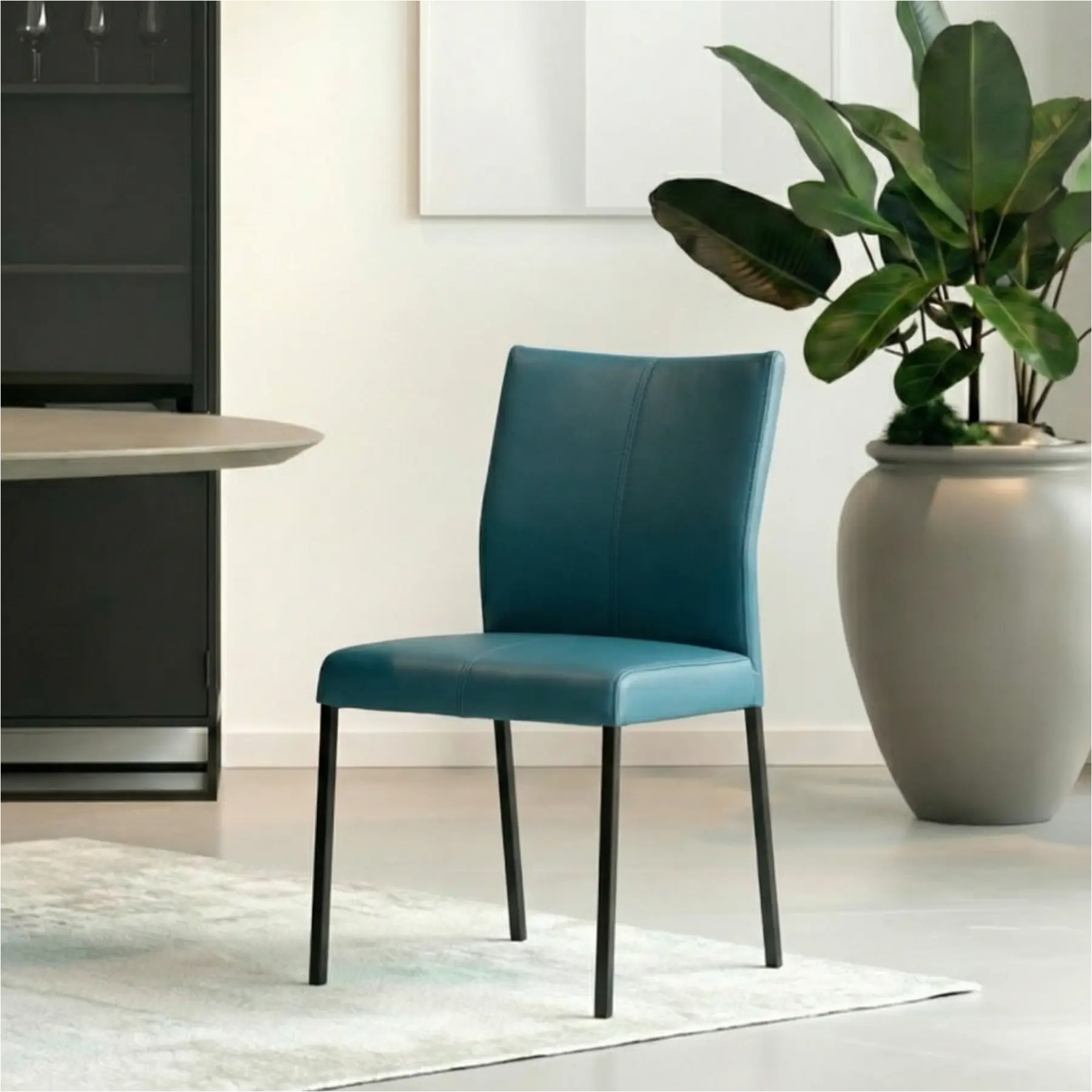 afbeelding van Leren eetkamerstoel Basic - Hermes Turquoise (blauw) - Poten staal vierkant zwart