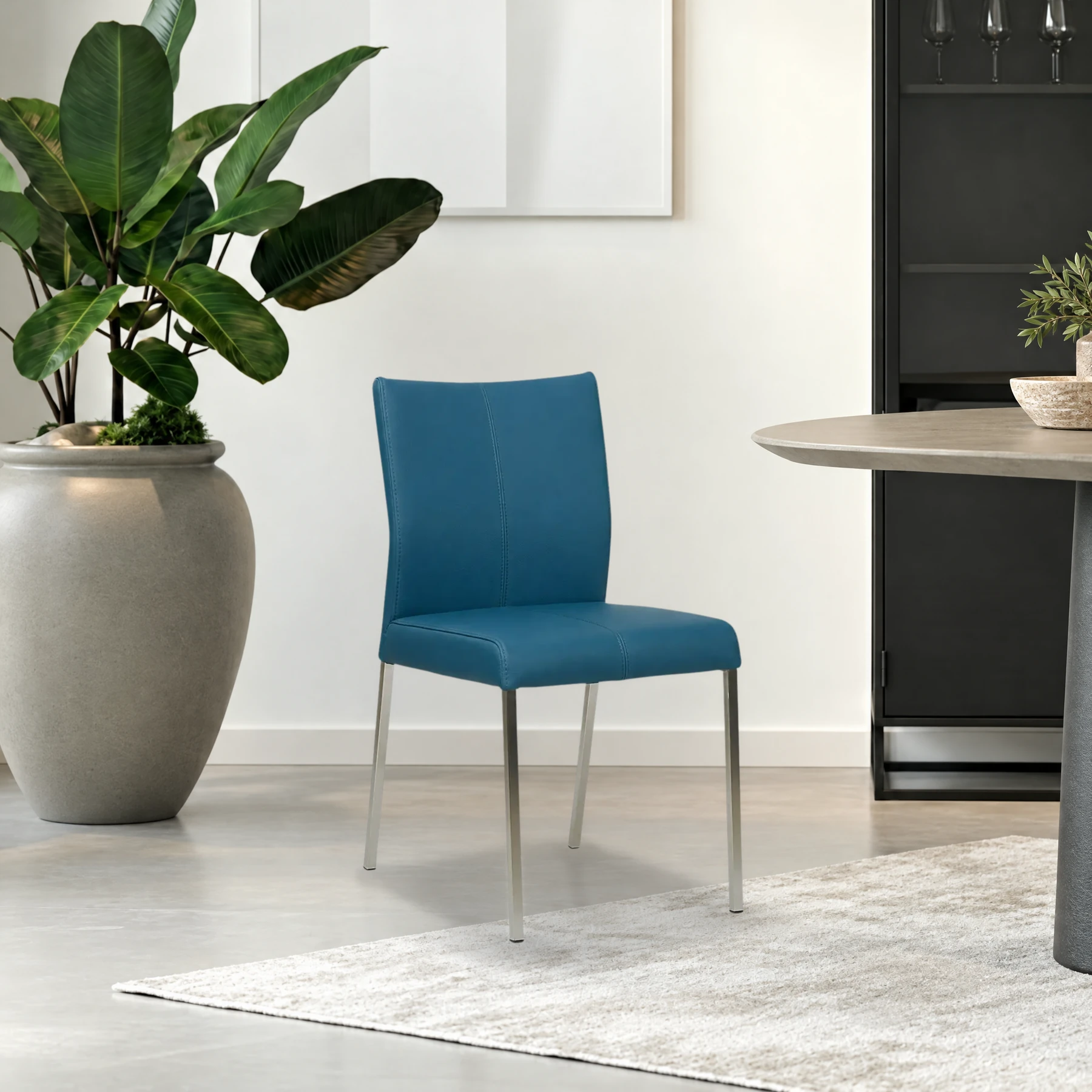 afbeelding van Leren eetkamerstoel Basic - Toledo Turquoise (blauw) - Poten staal vierkant RVS