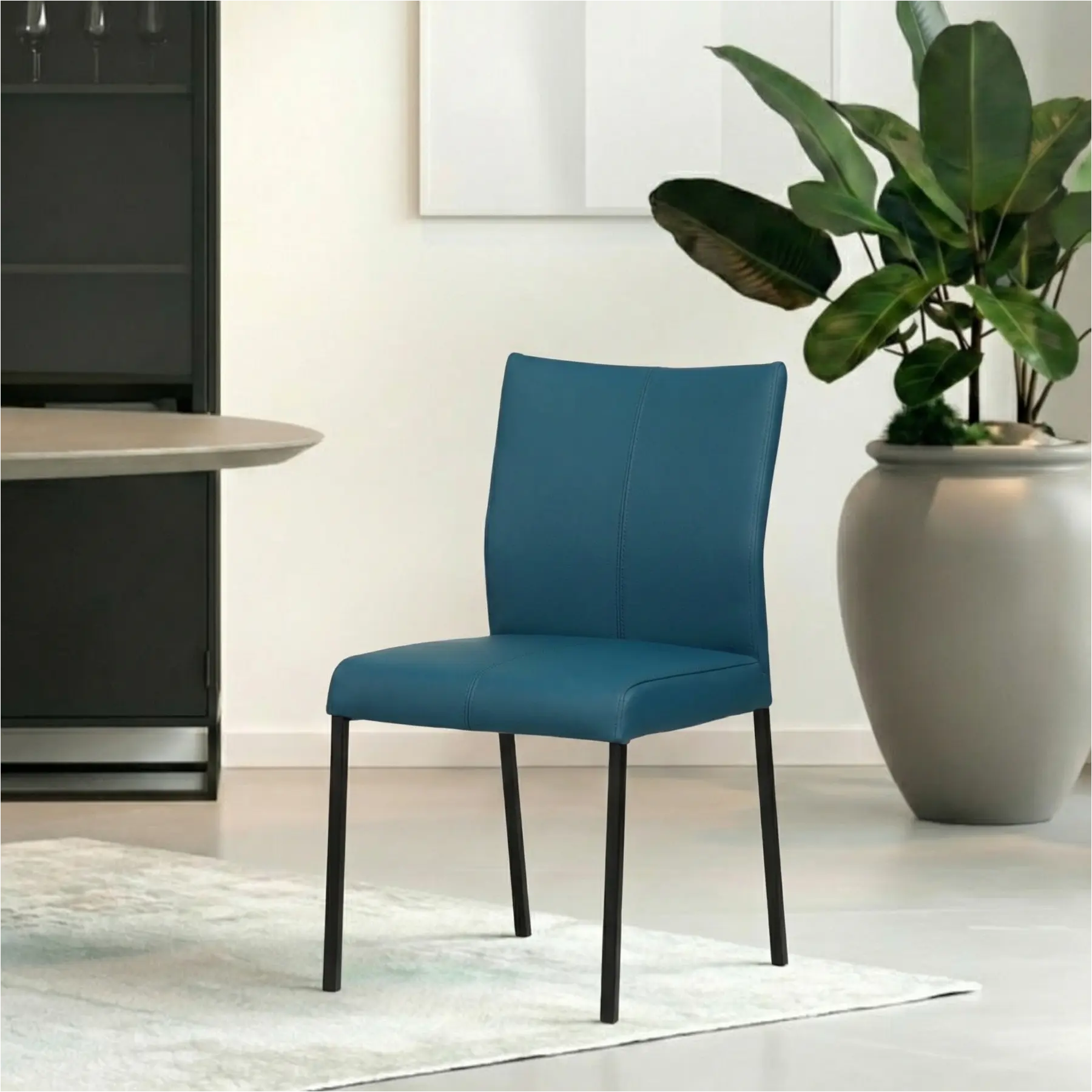 afbeelding van Leren eetkamerstoel Basic - Toledo Turquoise (blauw) - Poten staal vierkant zwart