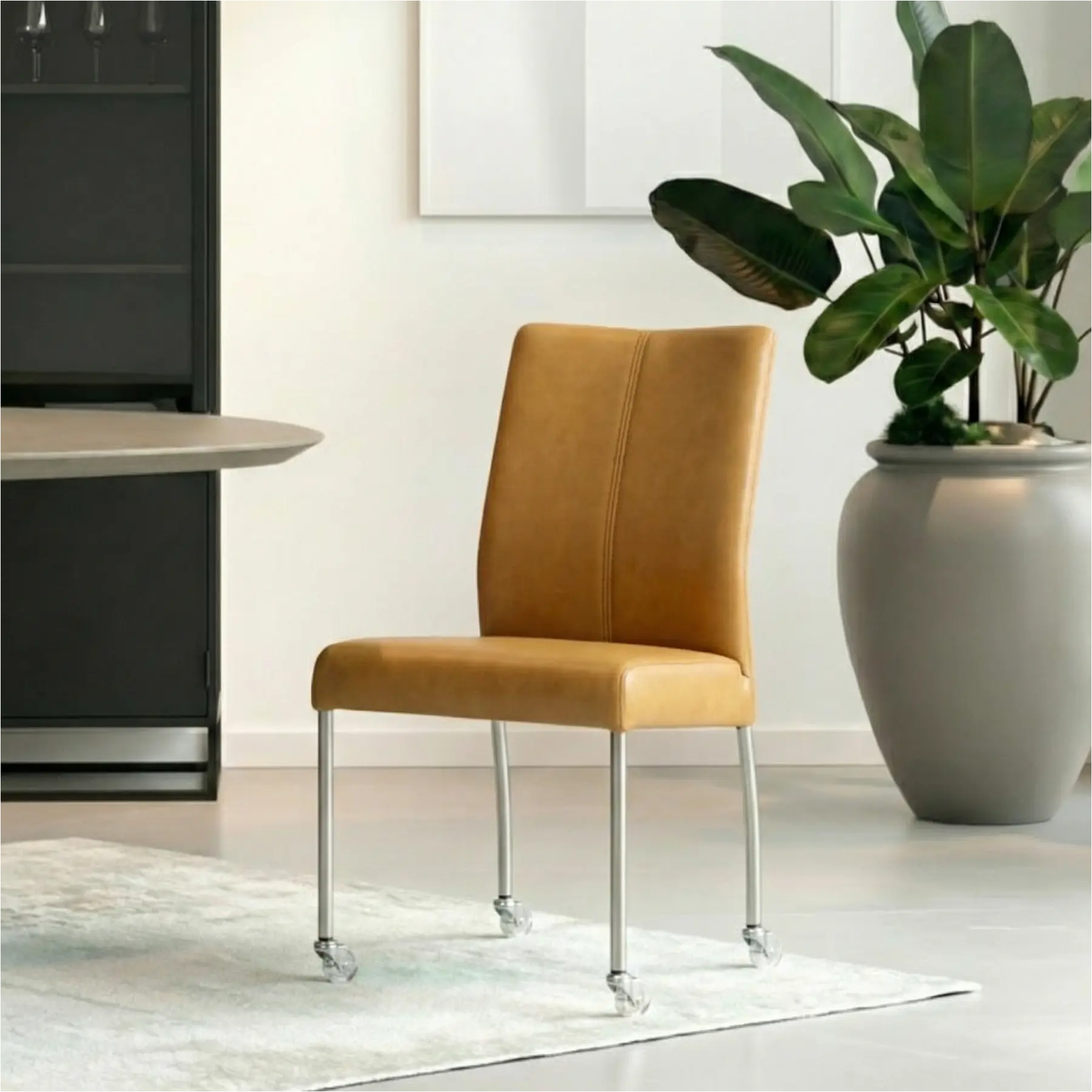 afbeelding van Leren eetkamerstoel Comfort met wieltjes - Granada Amber (cognac) - Poten staal rond RVS