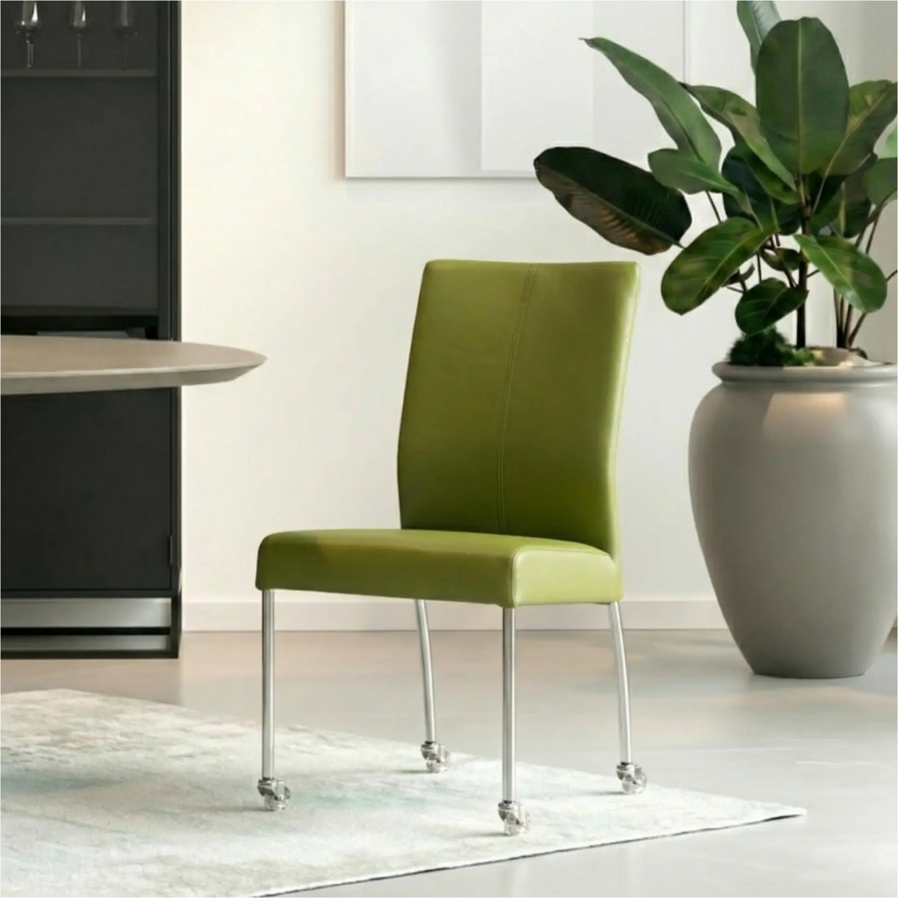 afbeelding van Leren eetkamerstoel Comfort met wieltjes - Toledo Apple Green (groen) - Poten staal rond RVS