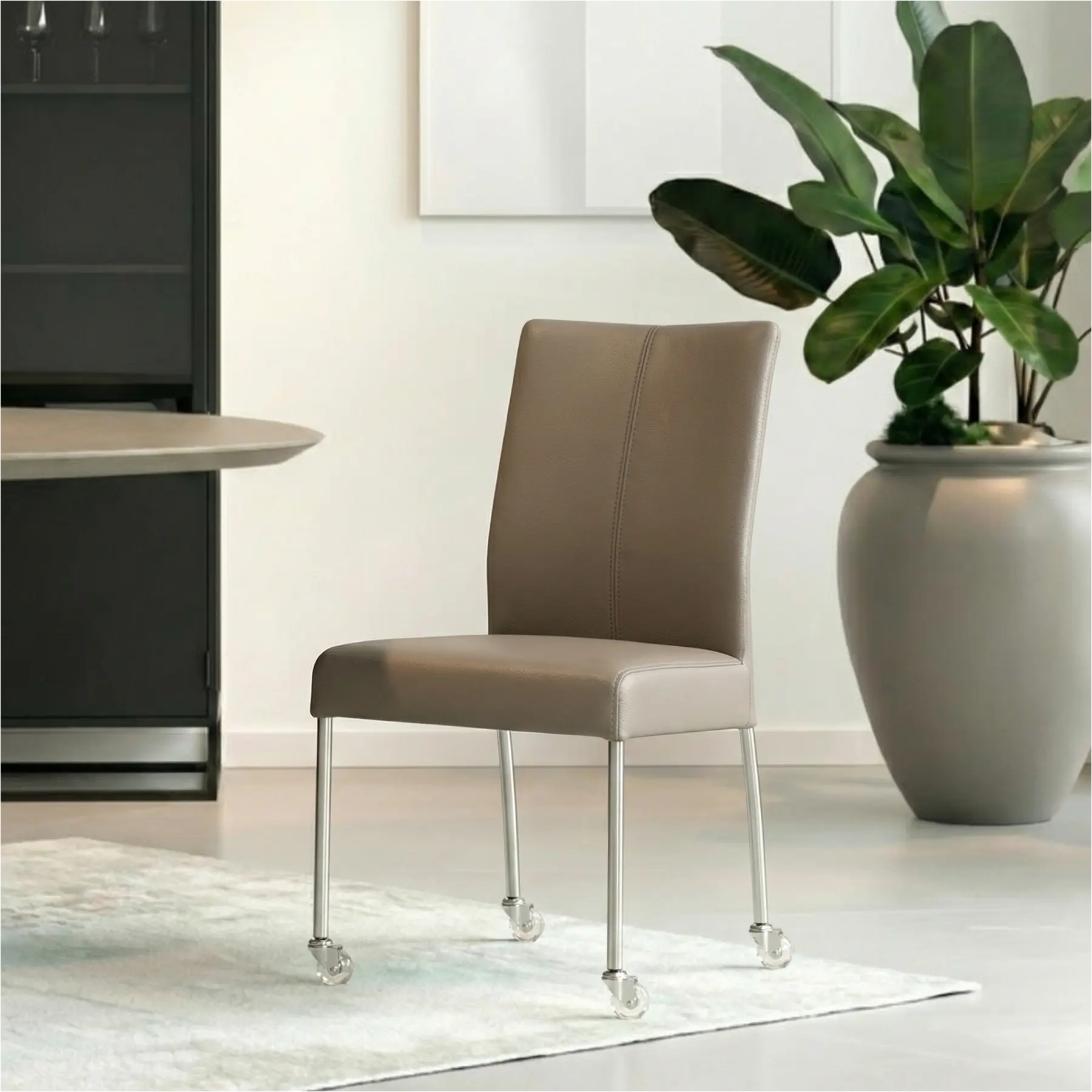 afbeelding van Leren eetkamerstoel Comfort met wieltjes - Toledo Moss (bruin/groen) - Poten staal rond RVS