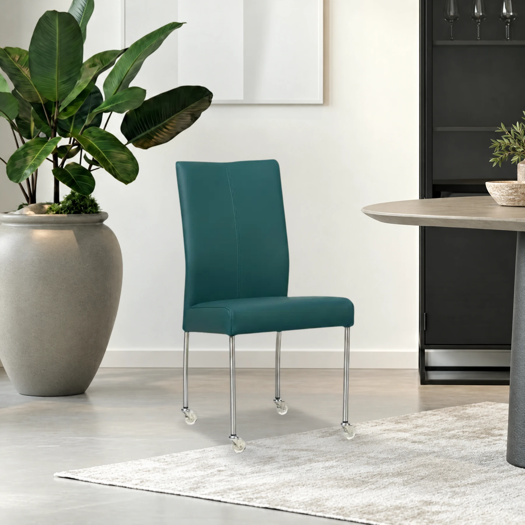 afbeelding van Leren eetkamerstoel Comfort met wieltjes - Toledo Turquoise (blauw) - Poten staal rond RVS