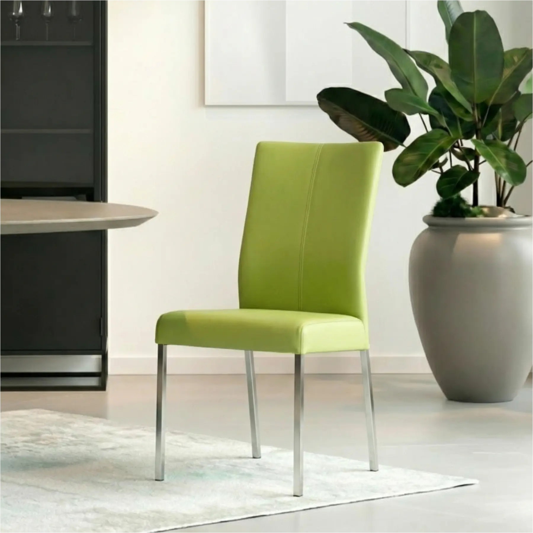 afbeelding van Leren eetkamerstoel Comfort met armleuning - Toledo Lime (felgroen) - Poten staal rond RVS