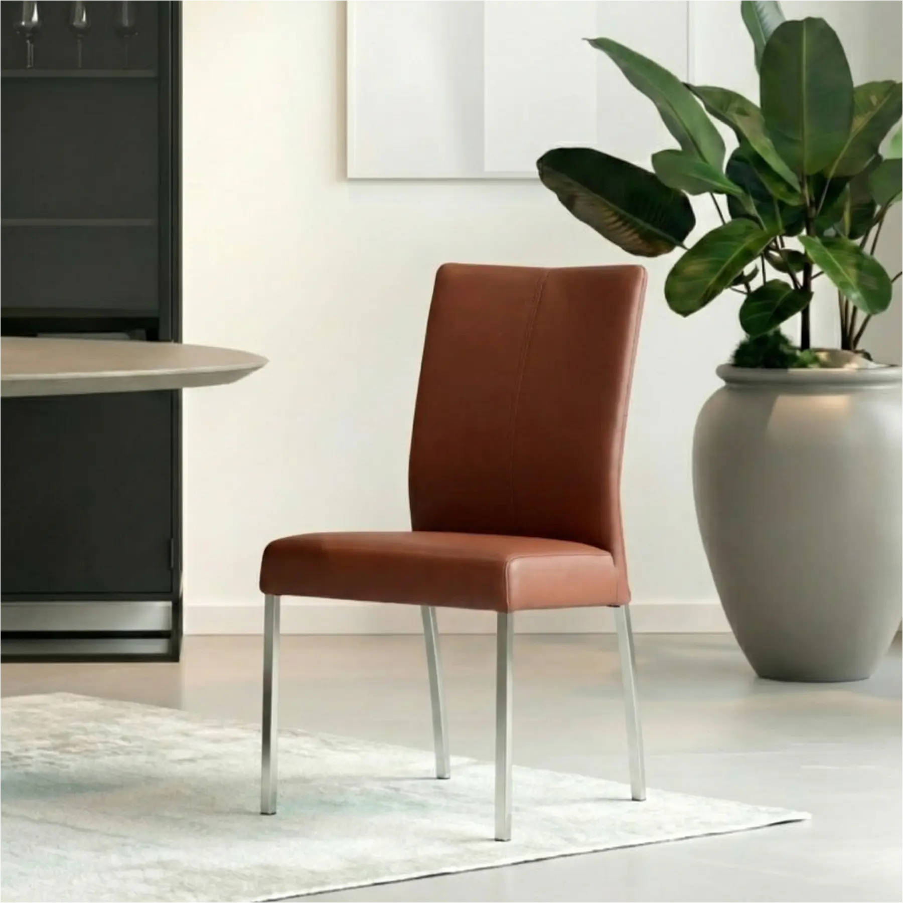 afbeelding van Leren eetkamerstoel Comfort - Toledo Terra (donkercognac) - Poten staal vierkant RVS