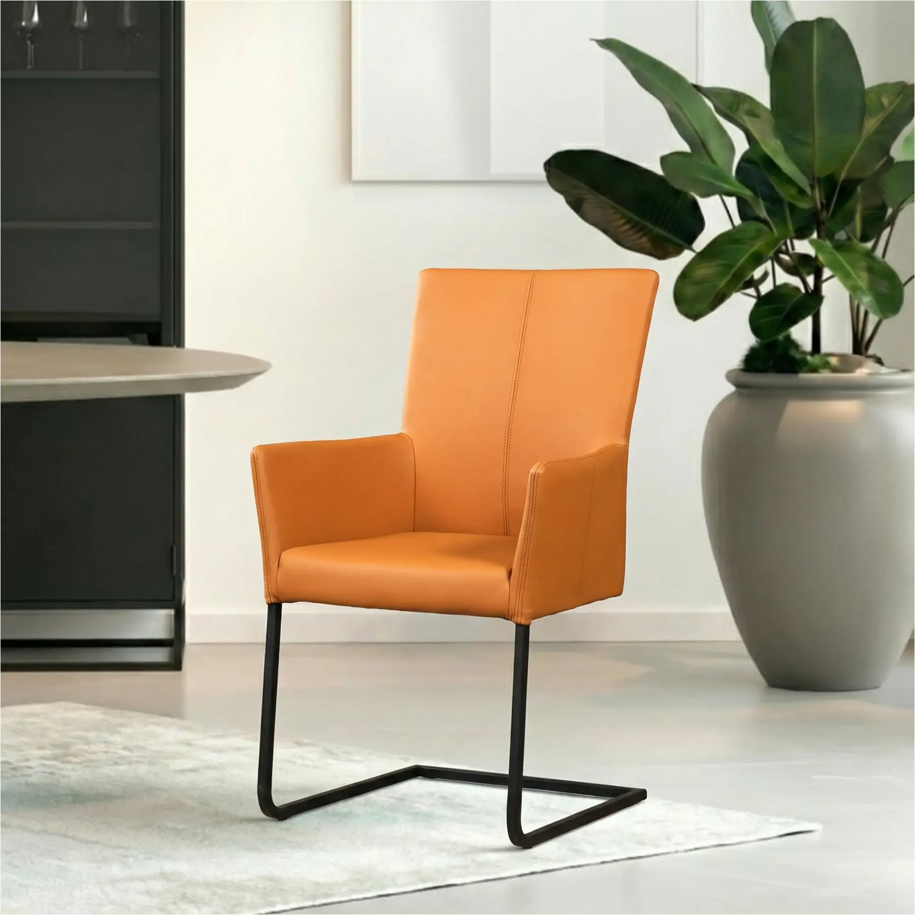 afbeelding van Leren eetkamerstoel Dare met armleuning