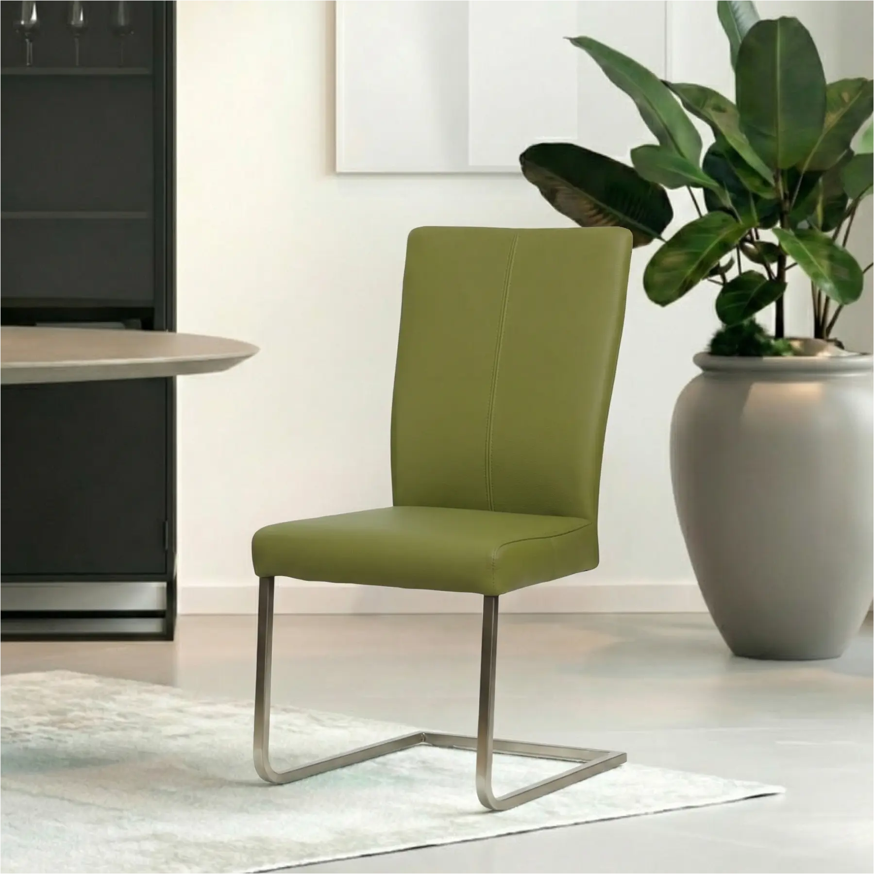 afbeelding van Leren eetkamerstoel Dare - Toledo Apple Green (groen) - Sledepoot staal vierkant RVS