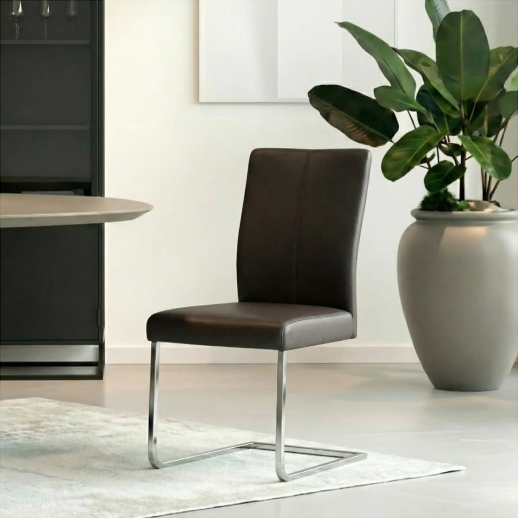 afbeelding van Leren eetkamerstoel Dare - Toledo Caffe (donkerbruin) - Sledepoot staal vierkant RVS