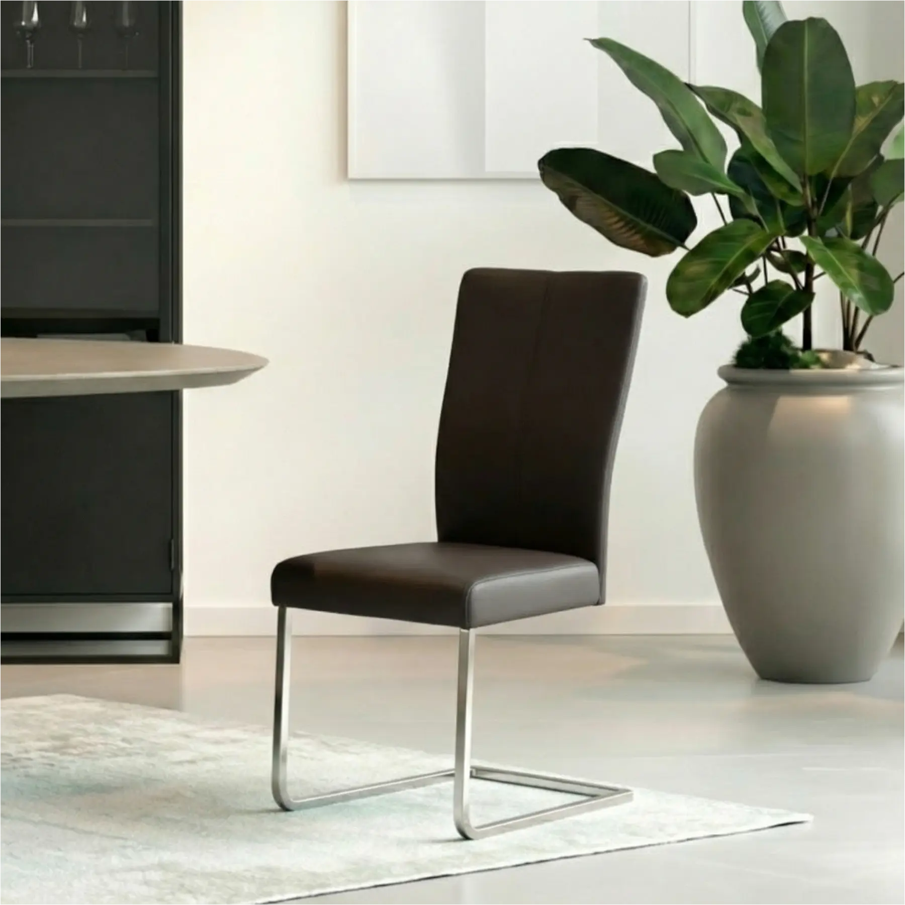 afbeelding van Leren eetkamerstoel Dare - Toledo Caffe (donkerbruin) - Sledepoot staal vierkant RVS