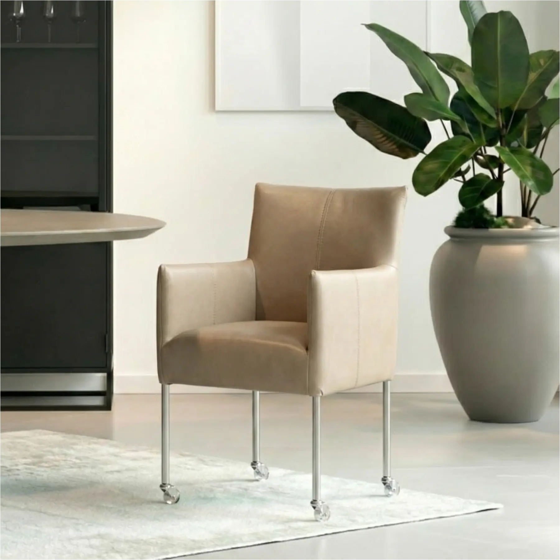 afbeelding van Leren eetkamerstoel Desire - Granada Taupe (taupe/bruin) - Poten staal rond RVS