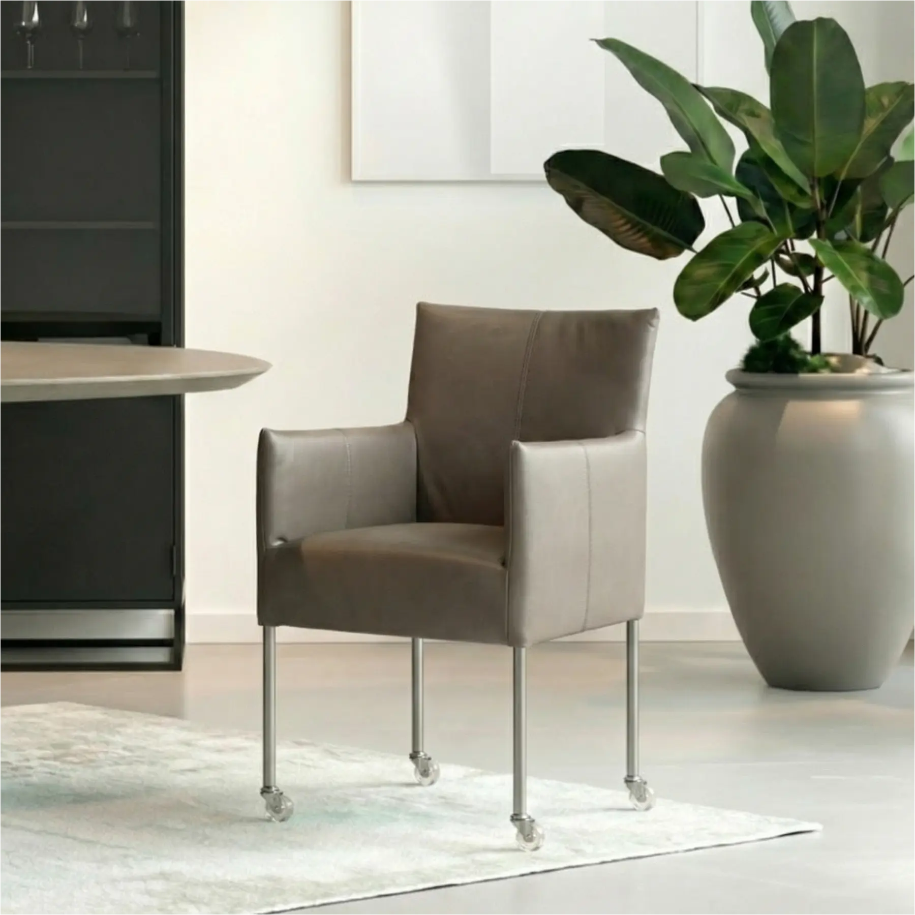 afbeelding van Leren eetkamerstoel Desire - Toledo Smog (grijs) - Poten staal rond RVS