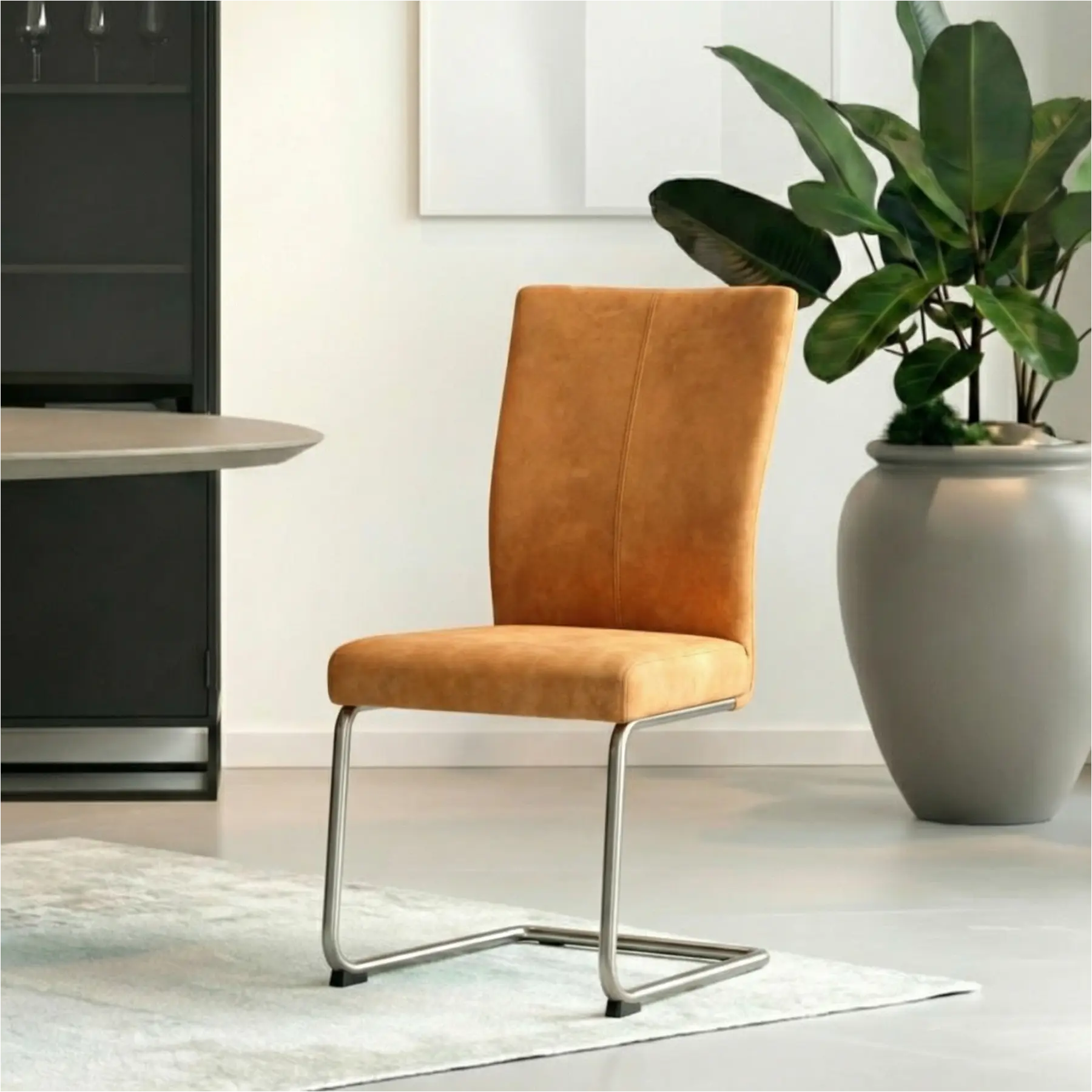 afbeelding van Leren eetkamerstoel Dry - Kenia Cognac (cognac) - Sledepoot staal rond RVS