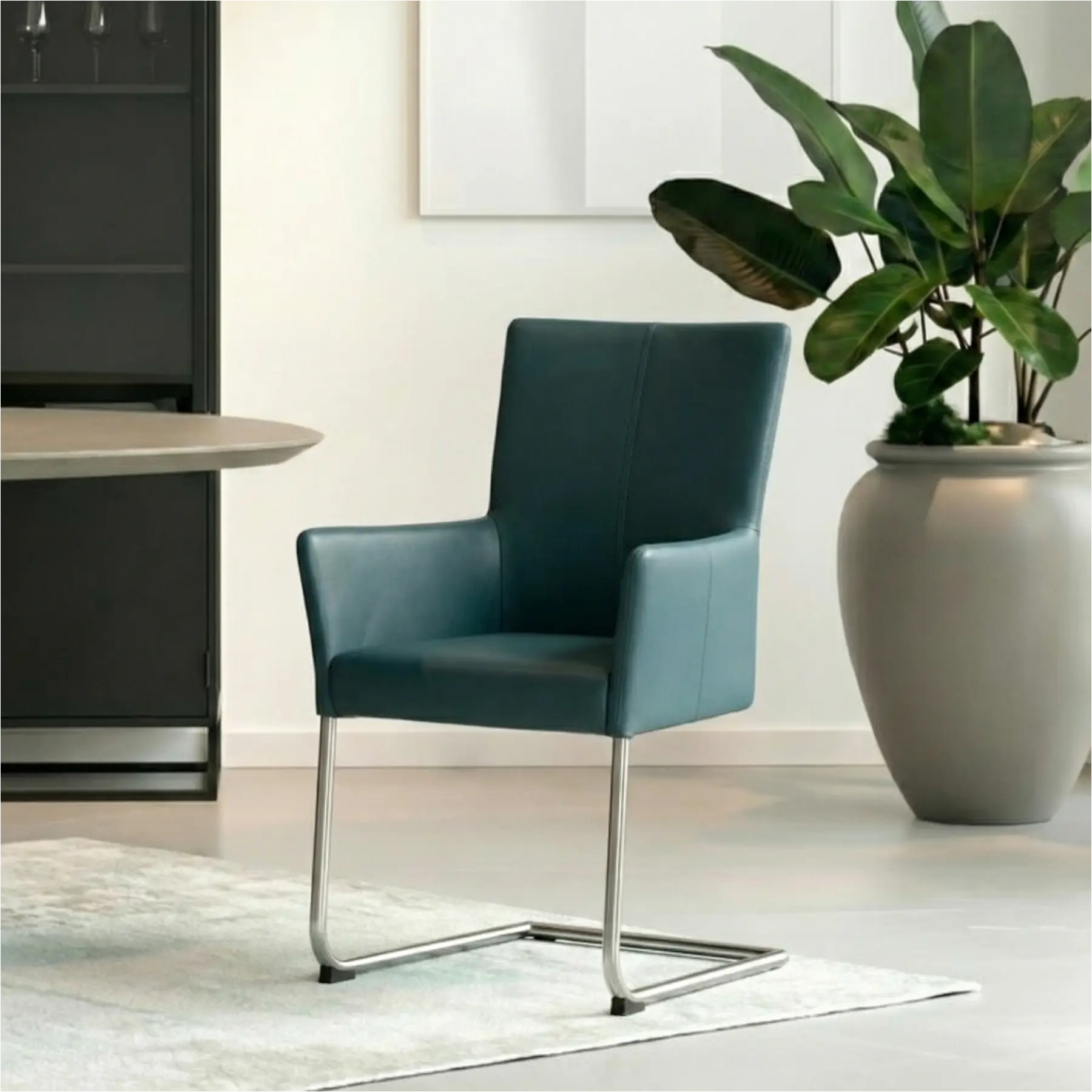 afbeelding van Leren eetkamerstoel Dry met armleuning