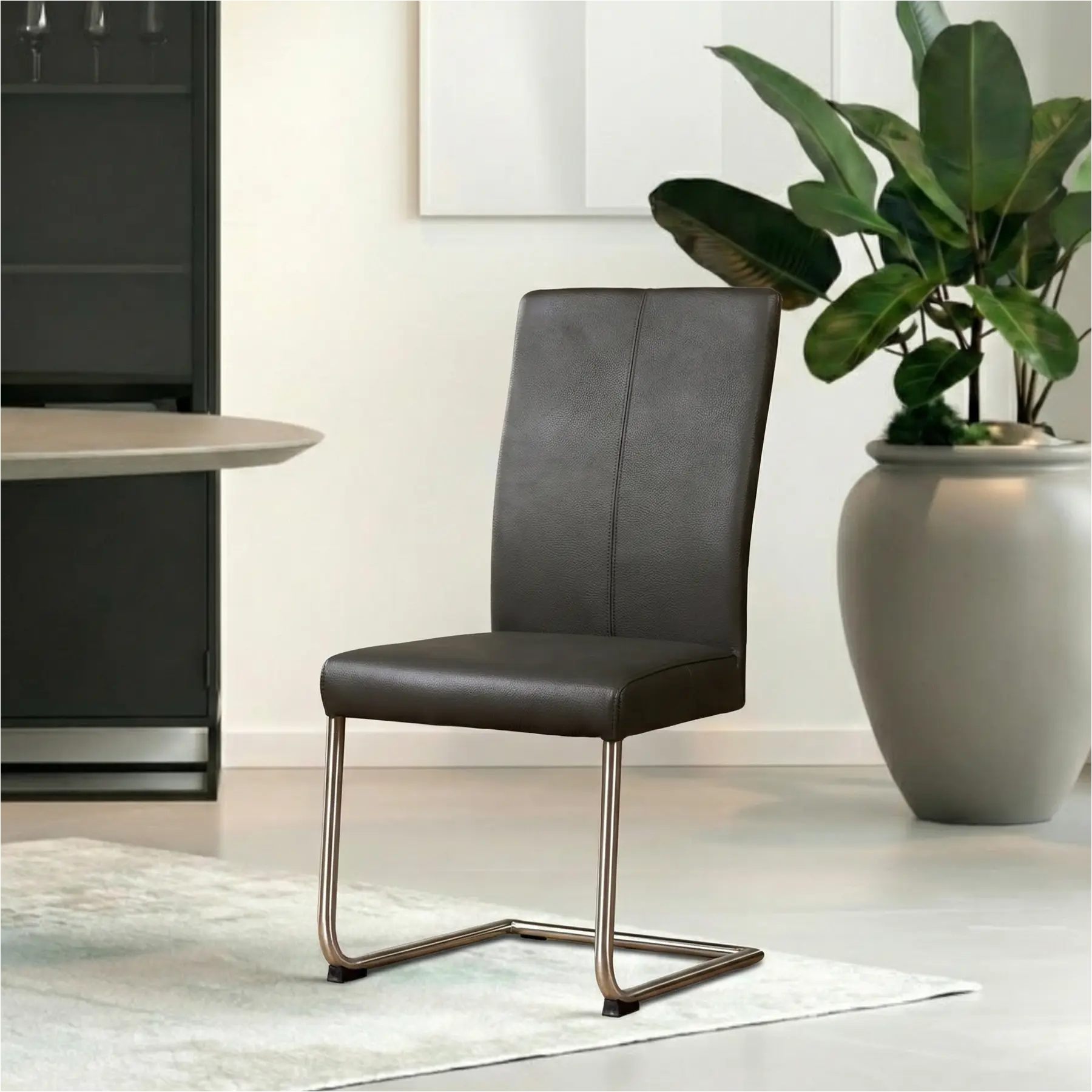 afbeelding van Leren eetkamerstoel Dry - Toledo Antracite (donkergrijs) - Sledepoot staal rond RVS