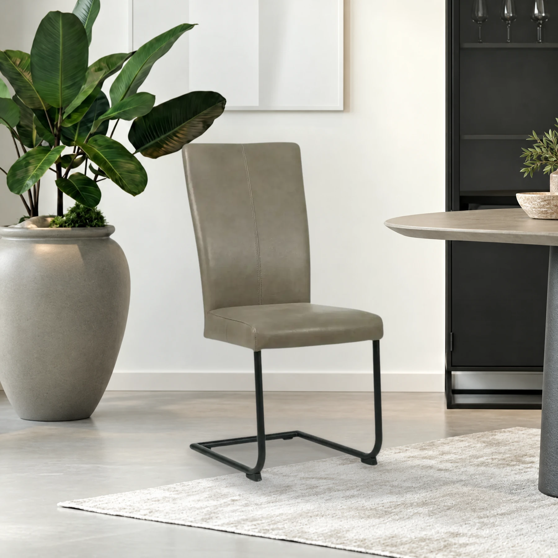 afbeelding van Leren eetkamerstoel Dry - Vintage Stone (grijs) - Sledepoot staal rond zwart