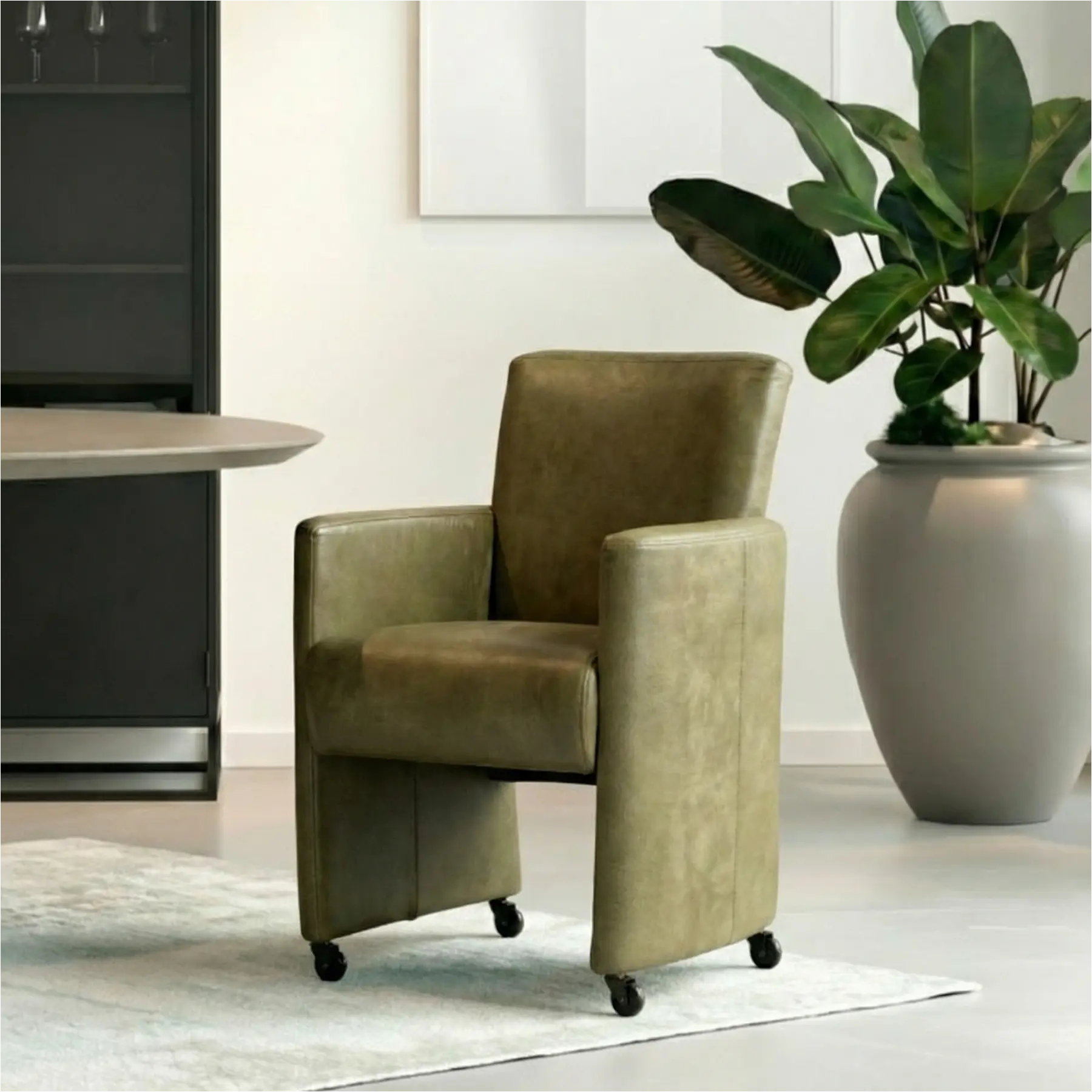 afbeelding van Leren eetkamerstoel Elegant - Kenia Olive (olijf) - Met handgreep RVS