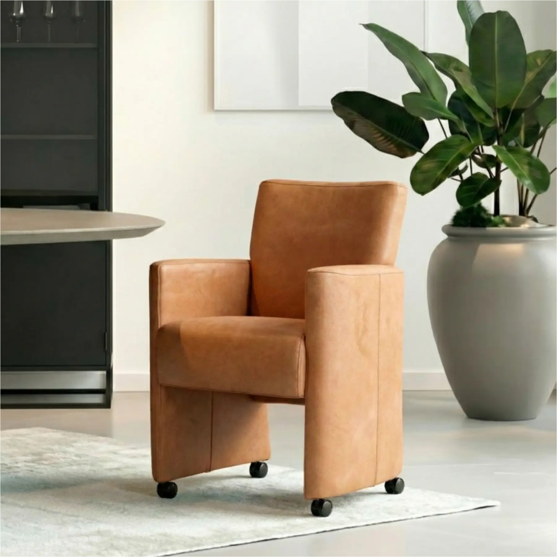 afbeelding van Leren eetkamerstoel Elegant - Kenia Rost (oranje) - Met handgreep zwart