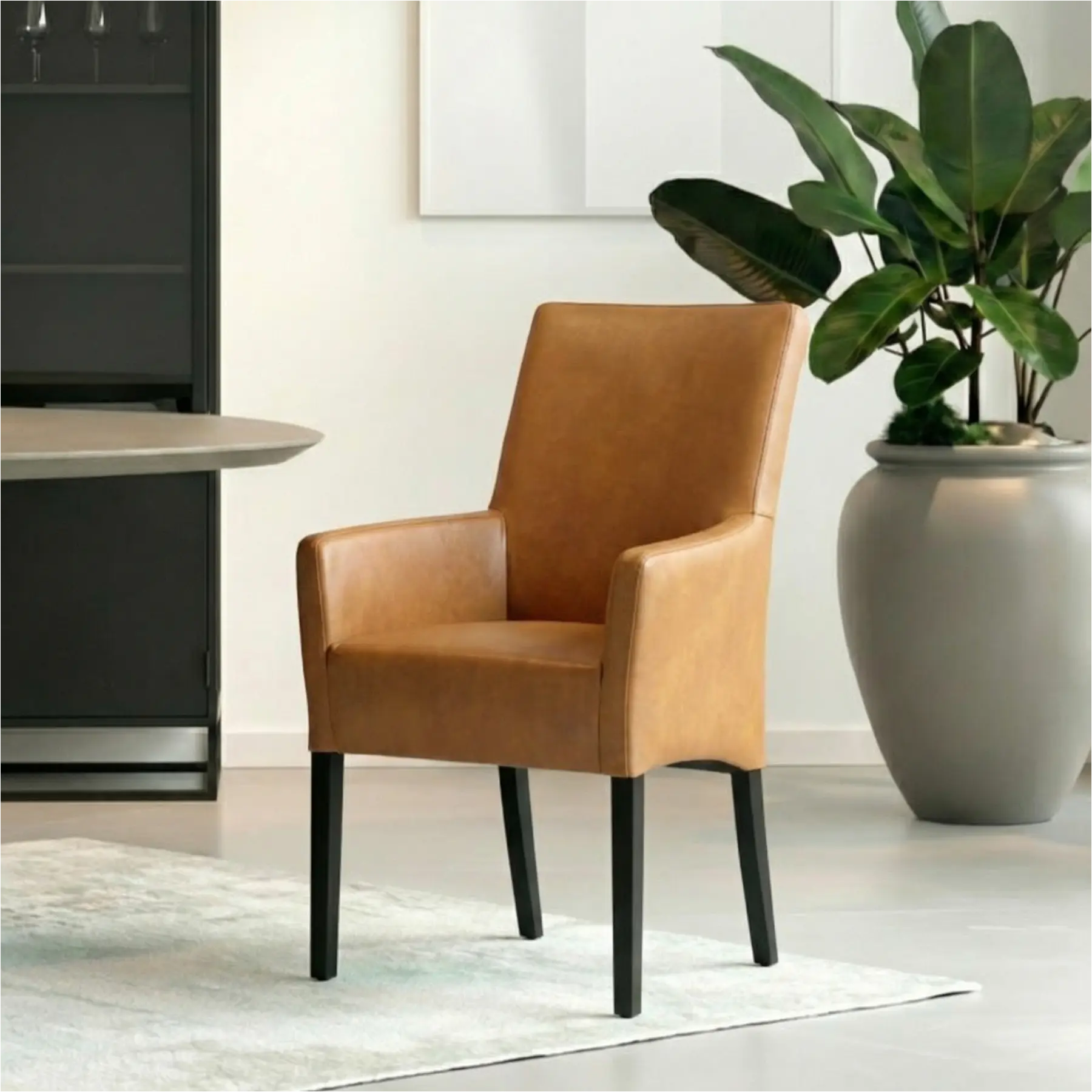 afbeelding van Leren eetkamerstoel Just met armleuning