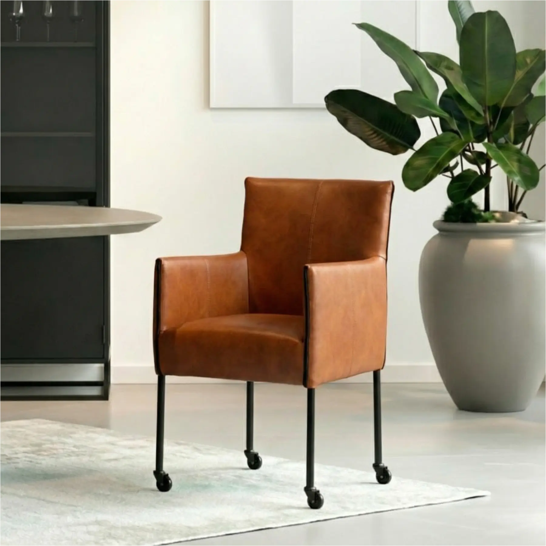 afbeelding van Leren eetkamerstoel More - Granada Savannah (cognac) - Poten staal rond zwart