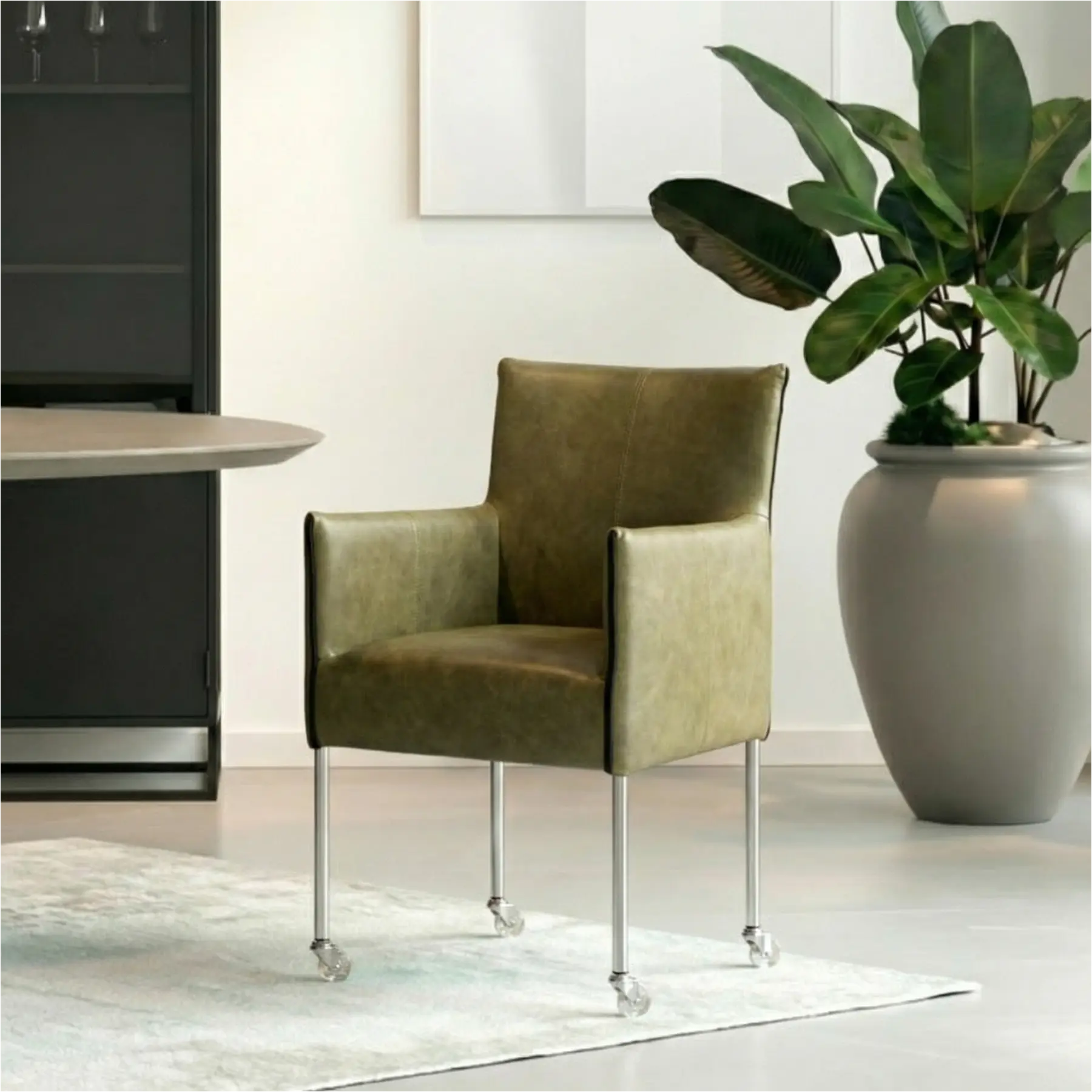 afbeelding van Leren eetkamerstoel More - Vintage Olive (olijf/groen) - Poten staal rond RVS