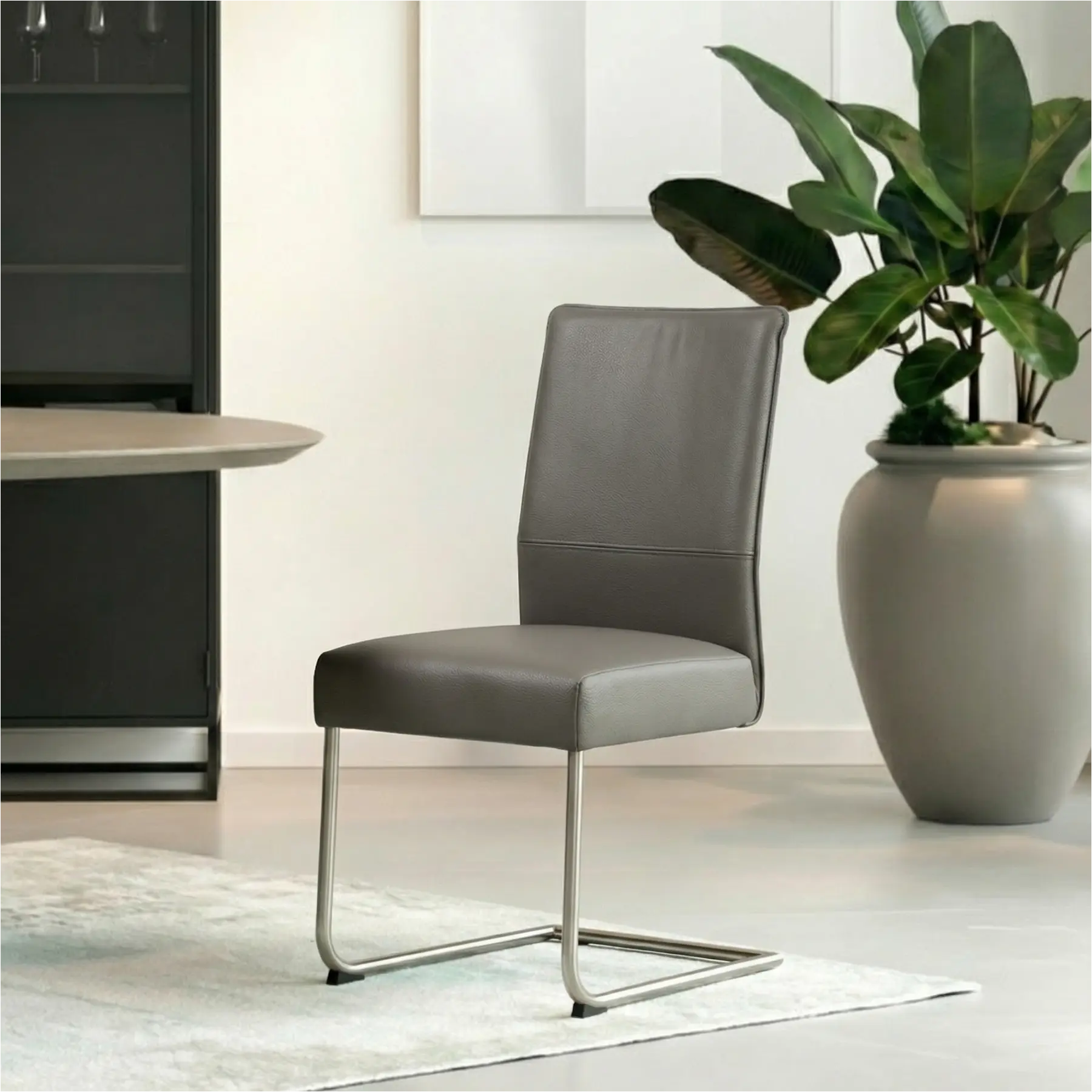 afbeelding van Leren eetkamerstoel Piece - Toledo Antracite (donkergrijs) - Sledepoot staal rond RVS