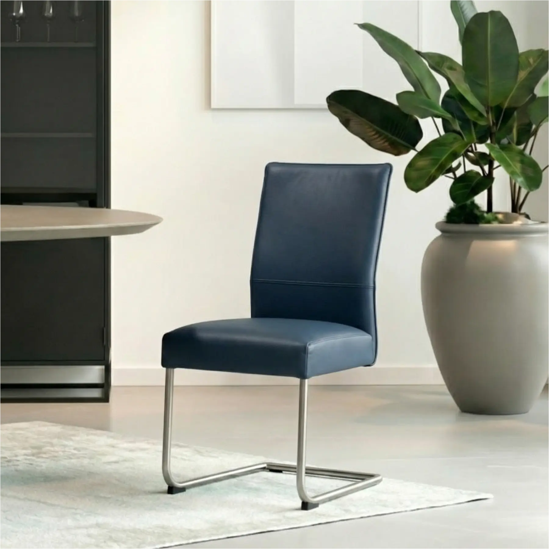 afbeelding van Leren eetkamerstoel Piece - Toledo Marine (blauw) - Sledepoot staal rond RVS