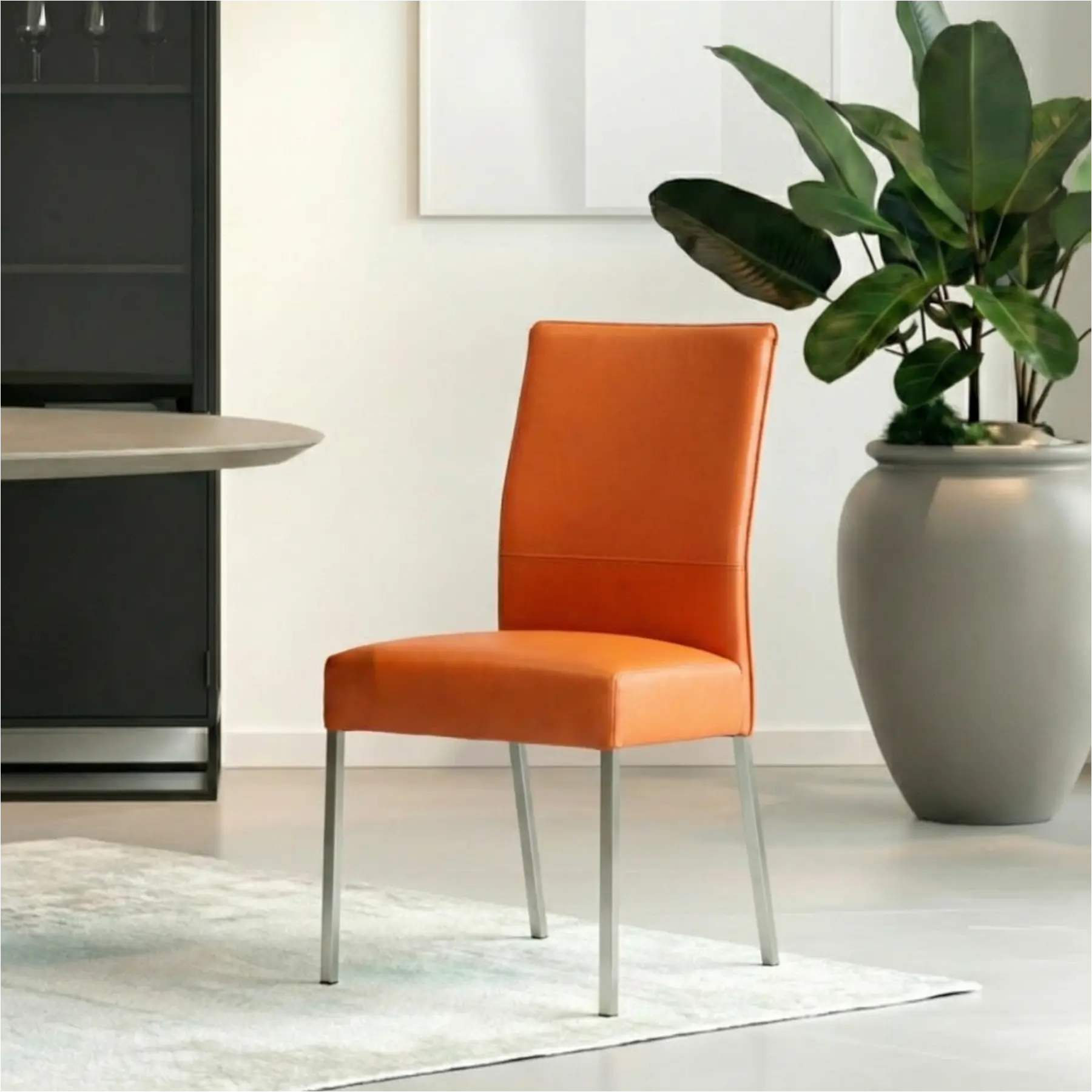 afbeelding van Leren eetkamerstoel Real - Toledo Orange (oranje) - Poten staal vierkant RVS