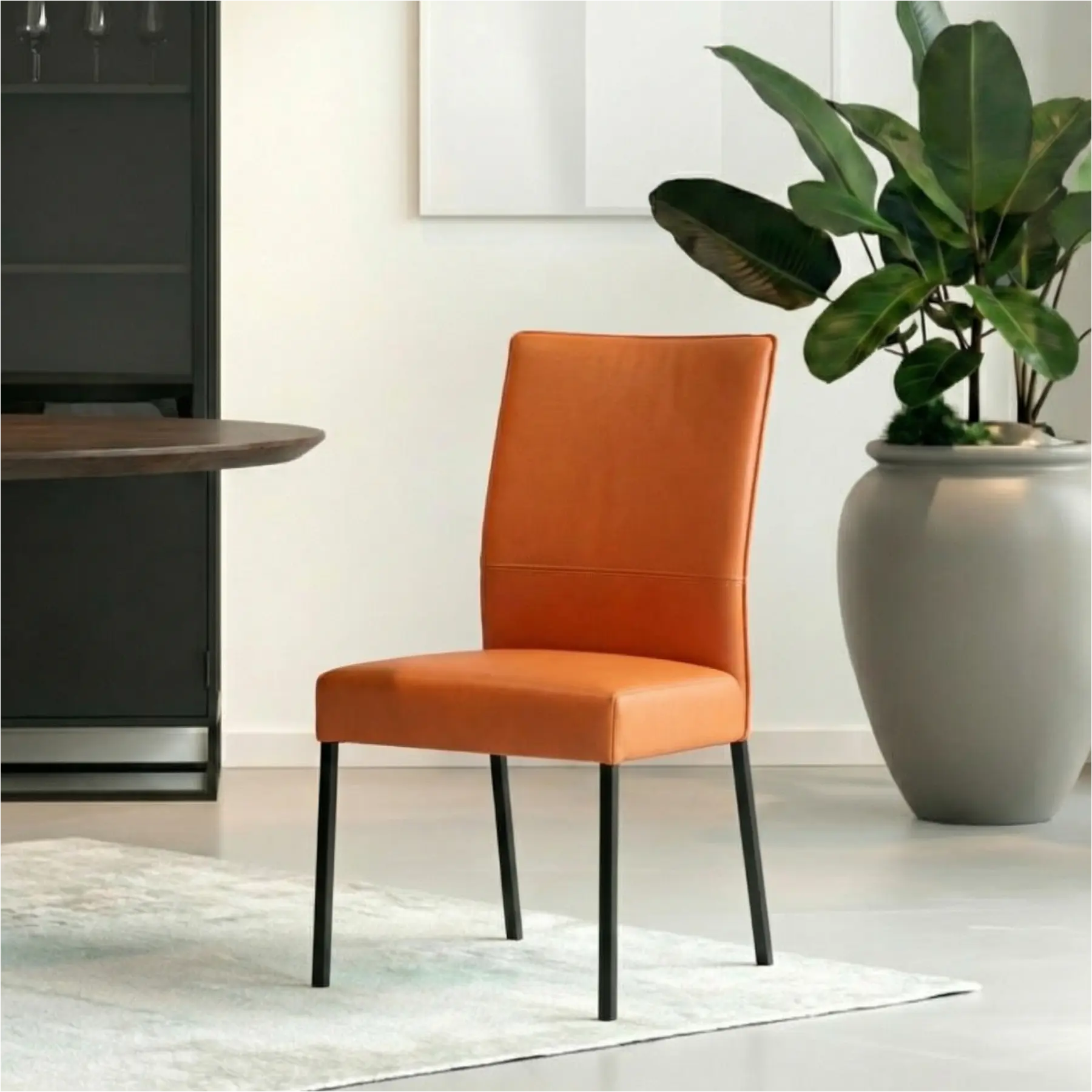 afbeelding van Leren eetkamerstoel Real - Toledo Orange (oranje) - Poten staal vierkant zwart