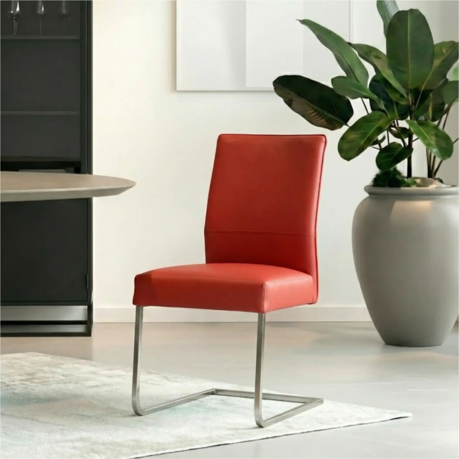 afbeelding van Leren eetkamerstoel Remix - Toledo Siegelstein (rood) - Sledepoot staal vierkant RVS