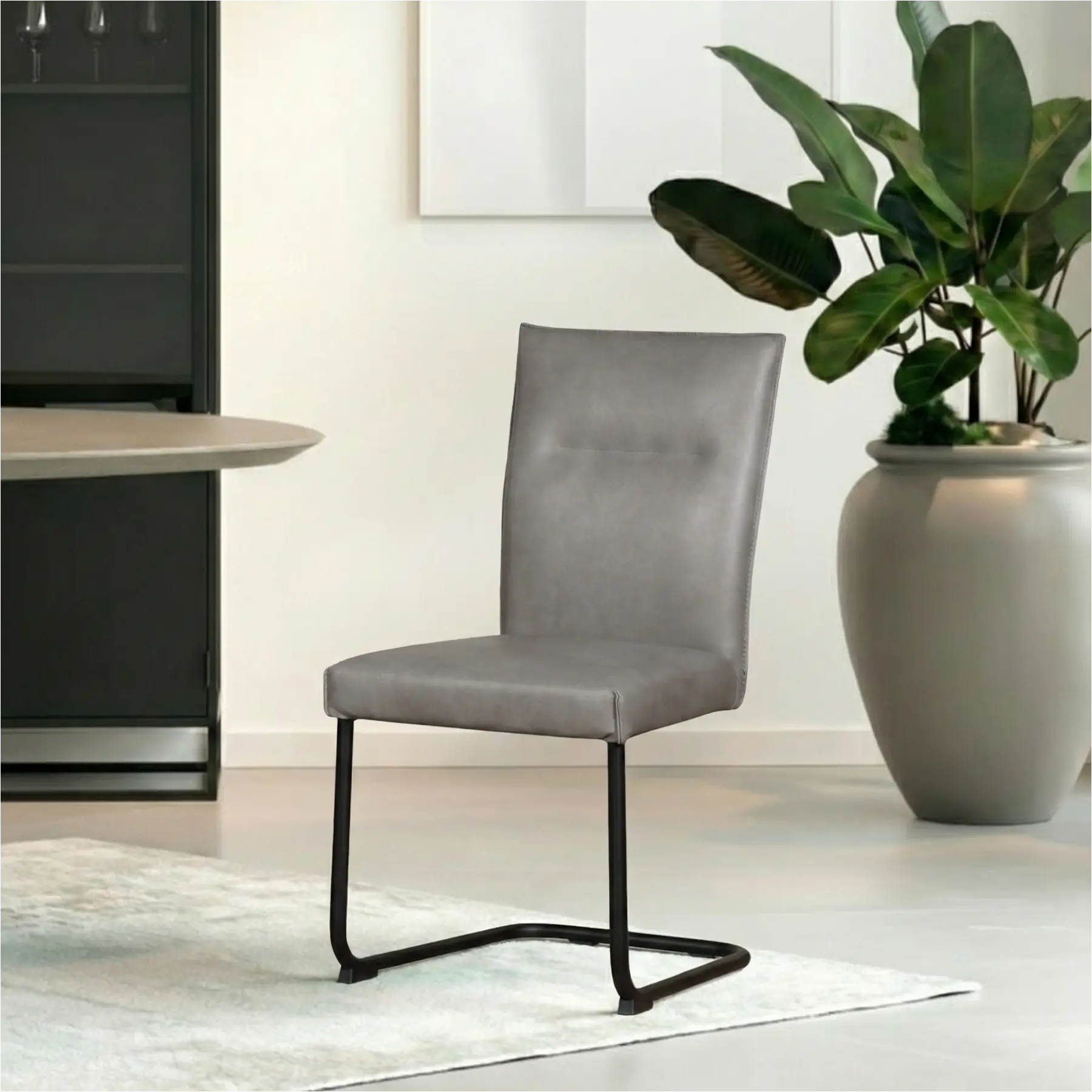 afbeelding van Leren eetkamerstoel Retro - Granada Steel (grijs) - Sledepoot staal rond zwart