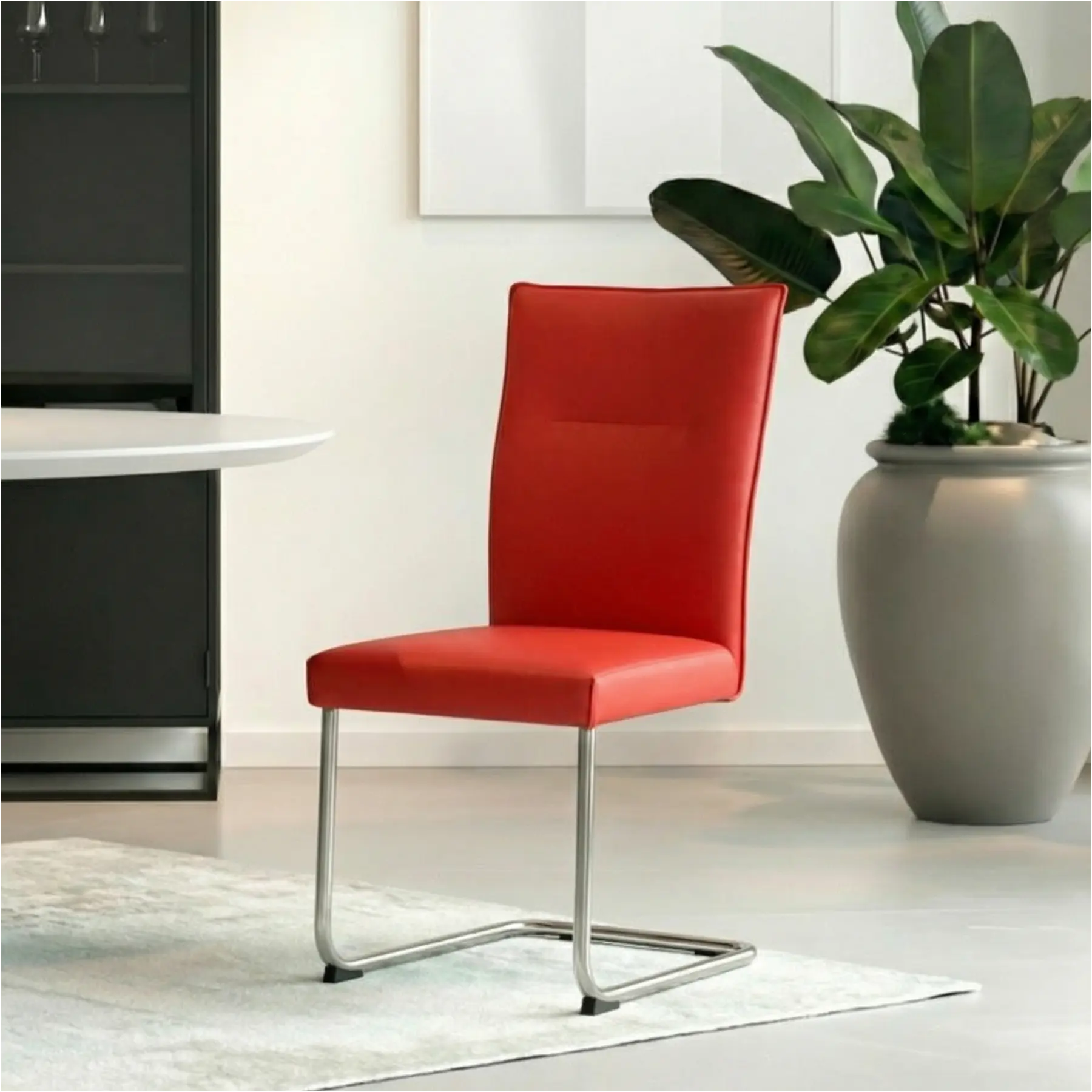 afbeelding van Leren eetkamerstoel Retro - Toledo Ferrari (felrood) - Sledepoot staal rond RVS