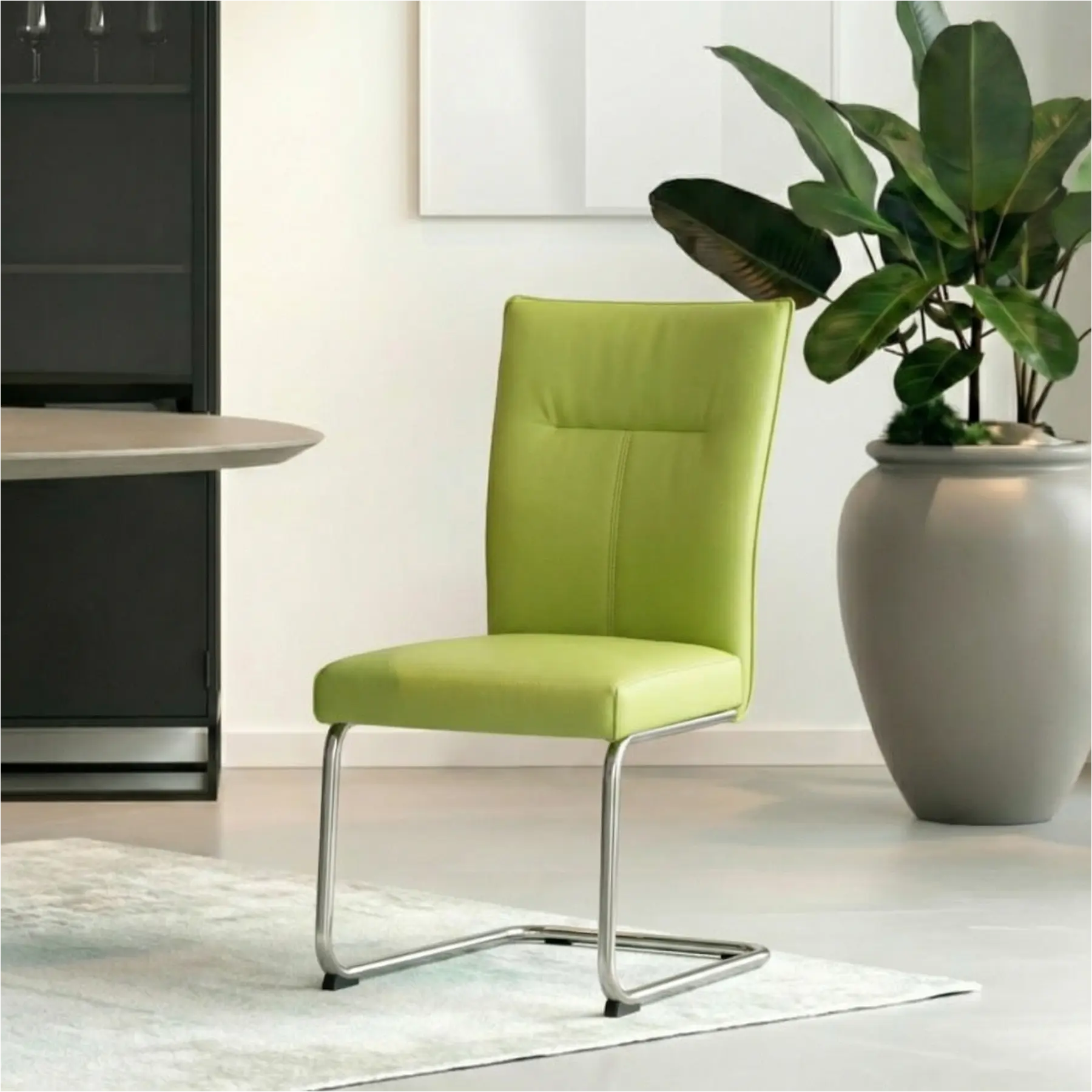 afbeelding van Leren eetkamerstoel Retro - Toledo Lime (felgroen) - Sledepoot staal rond RVS