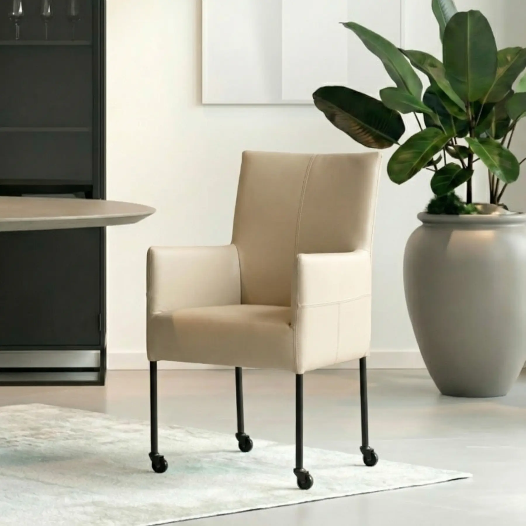 afbeelding van Leren eetkamerstoel Spark - Toledo Mastic (taupe/bruin) - Poten staal rond zwart