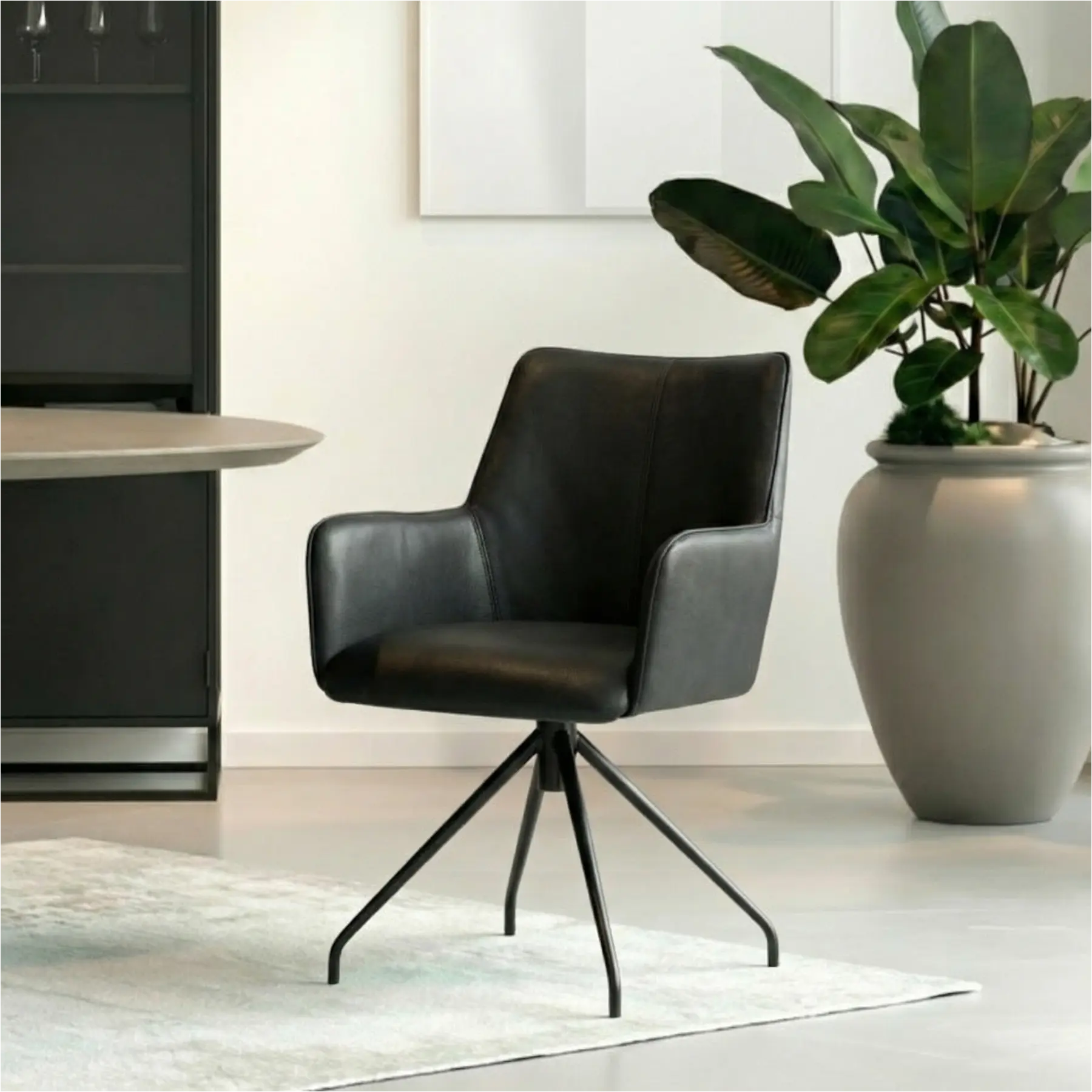 afbeelding van Leren eetkamerstoel Wave - Granada Black (zwart) - Spinpoot staal rond zwart