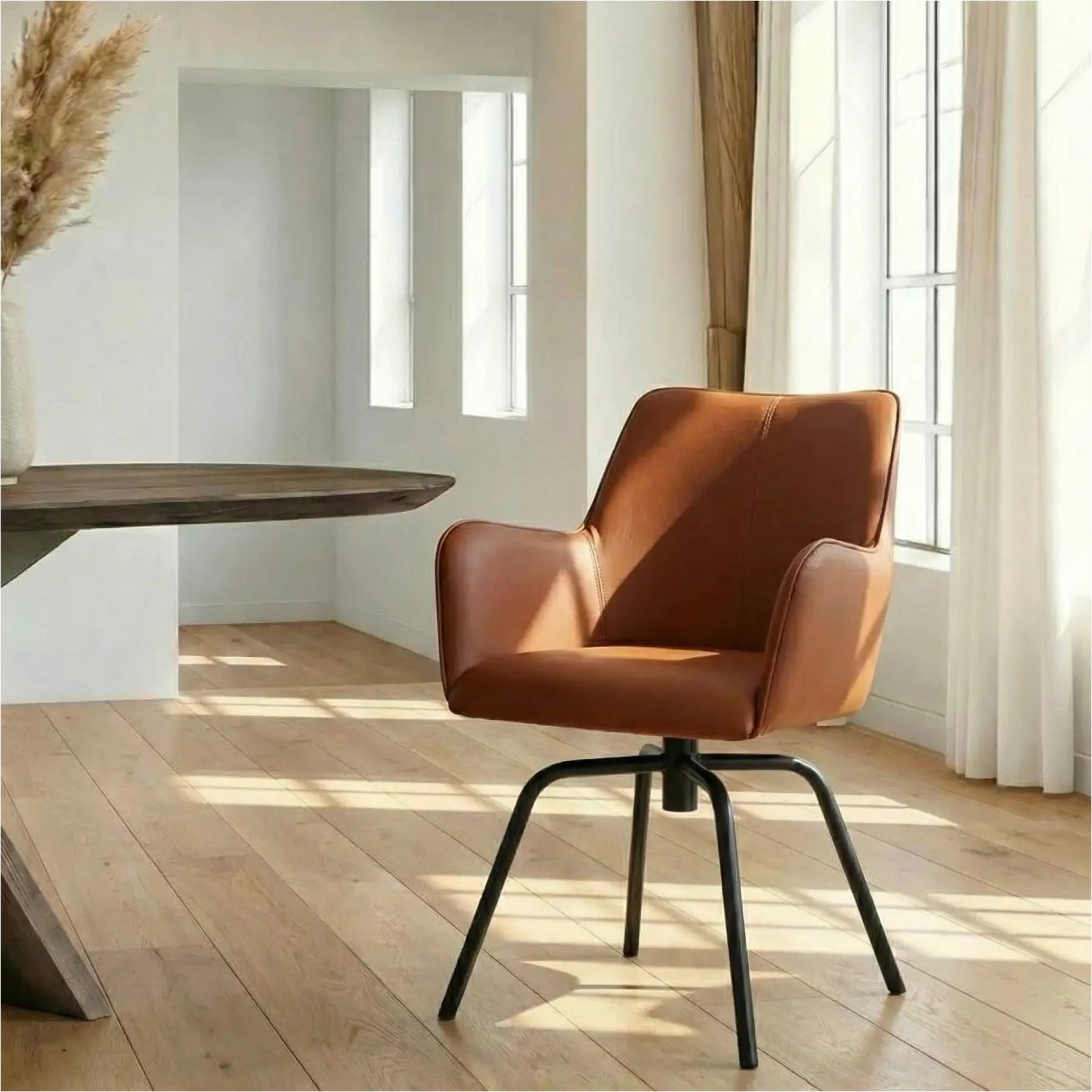 afbeelding van Leren draaibare eetkamerstoel Jazz - Toledo Natur (cognac) - Spinpoot staal rond zwart