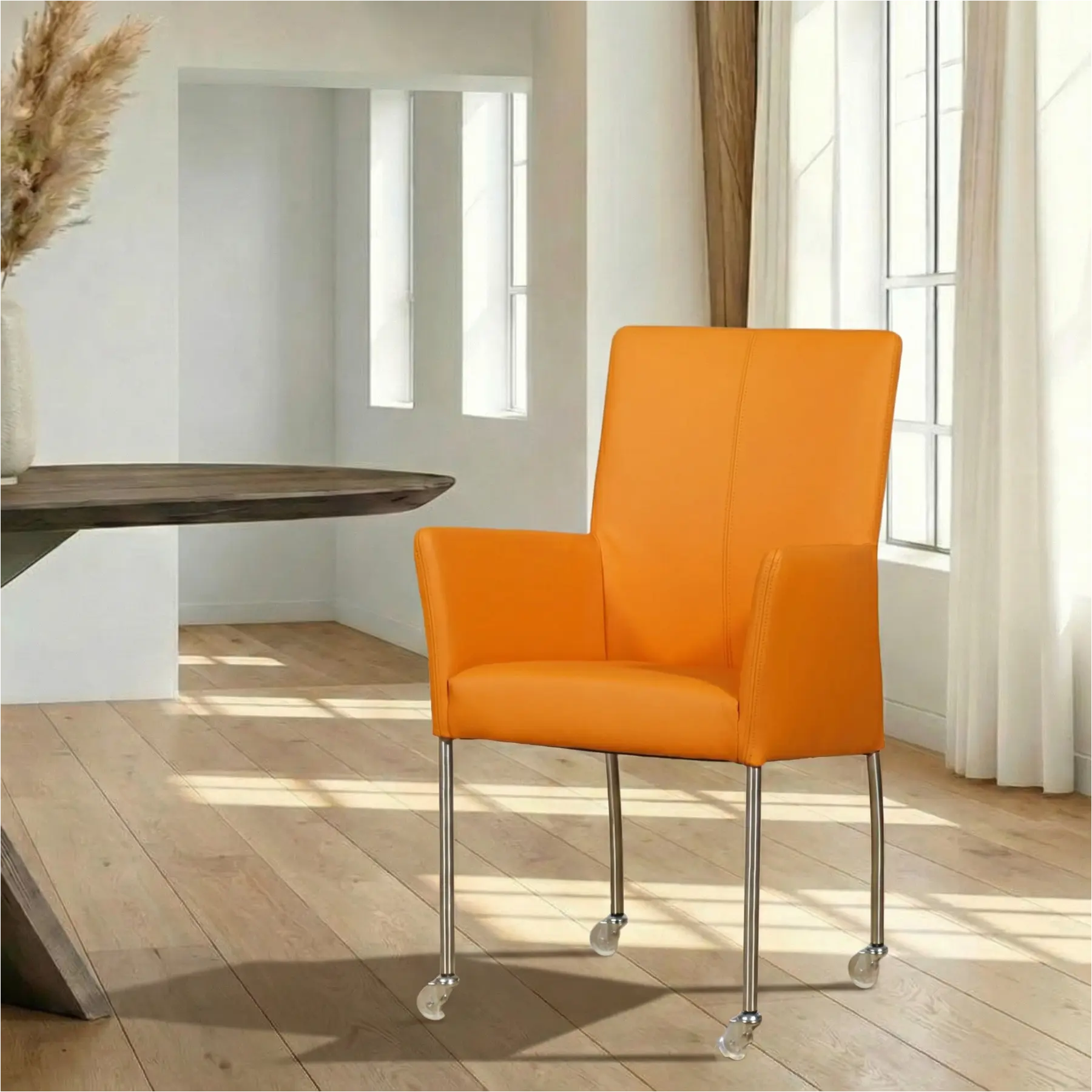 afbeelding van Leren eetkamerstoel Comfort met wieltjes en armleuning - Toledo Mandarin (oranje) - Poten staal rond RVS