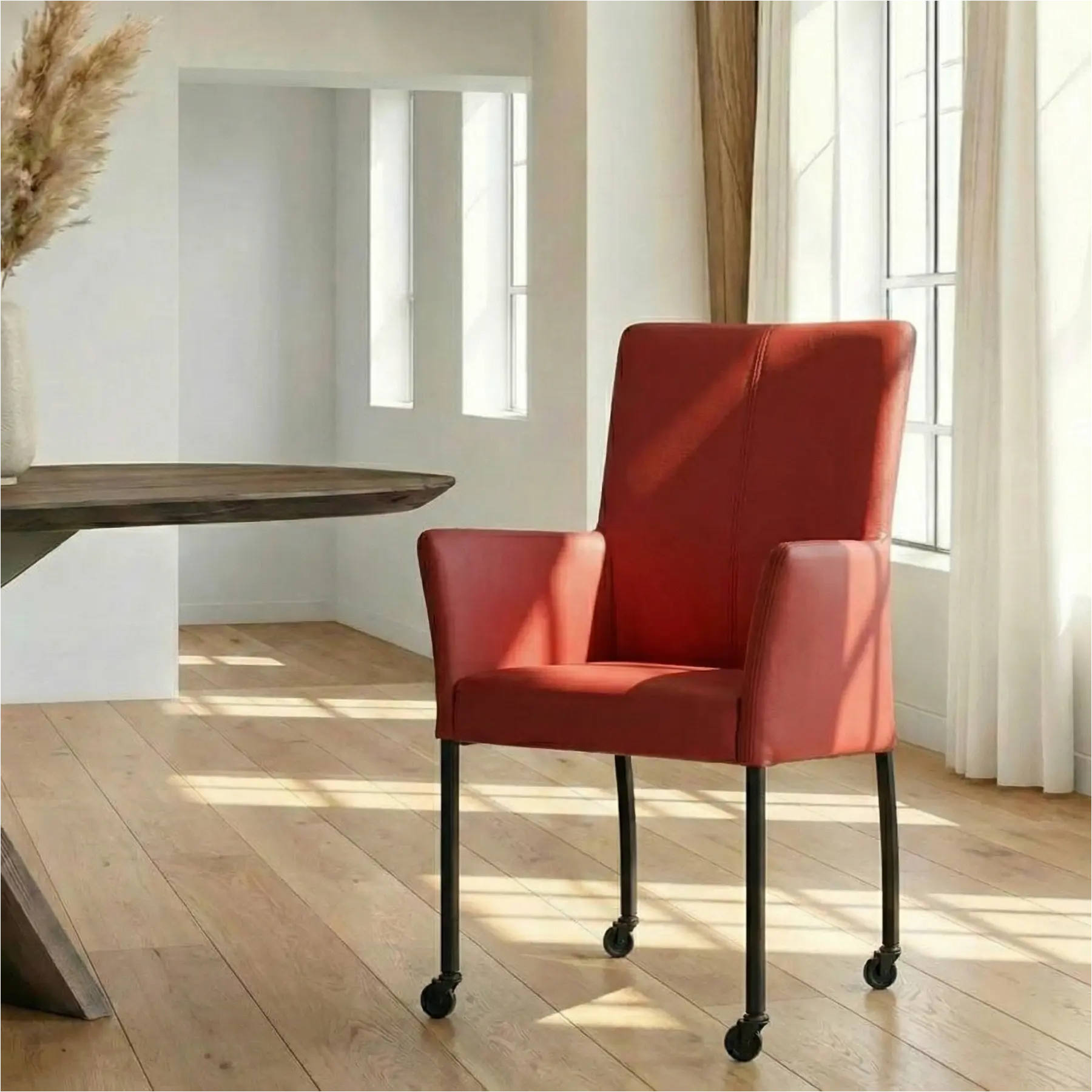 afbeelding van Leren eetkamerstoel Comfort met wieltjes en armleuning - Toledo Siegelstein (rood) - Poten staal vierkant zwart